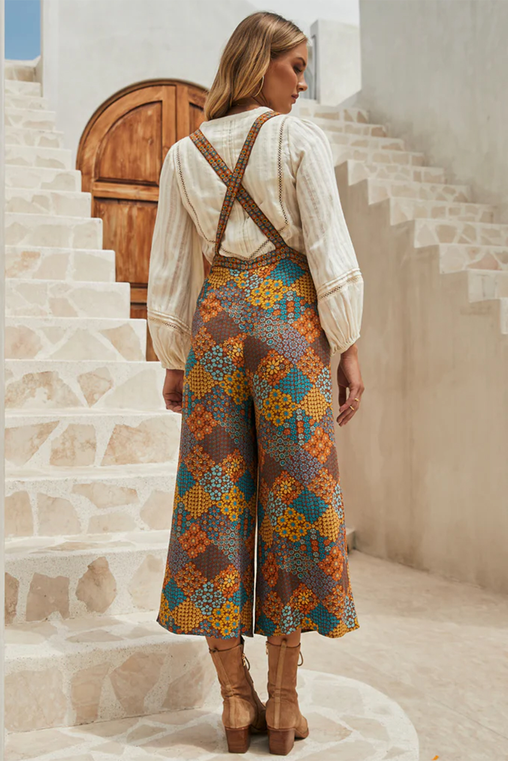 Stylish Bohemian Floral Jumpsuit with Wide Leg Pants and Adjustable Straps - Detail View 2 Stylish Bohemian Floral Jumpsuit with Wide Leg Pants and Adjustable Straps - Detail View 2