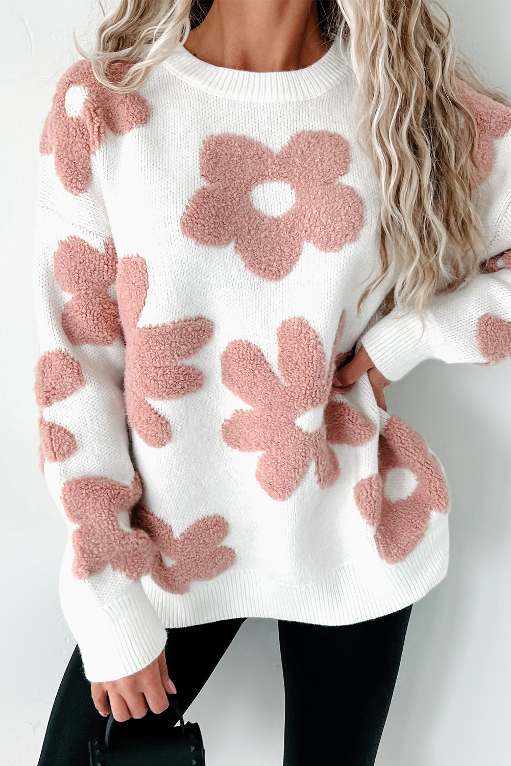 Add a touch of charm to your winter wardrobe with this Women's White Textured Flower Drop Shoulder Loose Sweater. The crew neck sweater features a popular French terry flower pattern, giving it a stylish and unique look. The relaxed fit and drop shoulder design exude a slouchy vibe, offering both comfort and a fashionable silhouette. Made from a blend of 42% acrylic, 30% polyester, and 28% polyamide, this pullover knitwear provides warmth and coziness, making it suitable for most winter activities. The versatile white color makes it easy to match with jeans, leggings, or your favorite winter bottoms. Stay cozy and stylish with this must-have winter sweater, perfect for daily wear and casual outings. - Detail View 4 Add a touch of charm to your winter wardrobe with this Women's White Textured Flower Drop Shoulder Loose Sweater. The crew neck sweater features a popular French terry flower pattern, giving it a stylish and unique look. The relaxed fit and drop shoulder design exude a slouchy vibe, offering both comfort and a fashionable silhouette. Made from a blend of 42% acrylic, 30% polyester, and 28% polyamide, this pullover knitwear provides warmth and coziness, making it suitable for most winter activities. The versatile white color makes it easy to match with jeans, leggings, or your favorite winter bottoms. Stay cozy and stylish with this must-have winter sweater, perfect for daily wear and casual outings. - Detail View 4