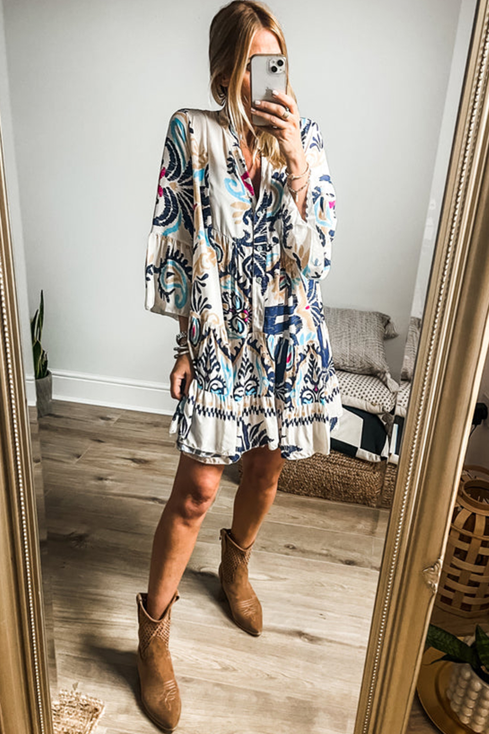 Add a bold and vibrant touch to your wardrobe with this Women's White Printed Tribal Print Bracelet Sleeve Buttoned Mini Dress. The tribal print design adds a unique and eye-catching element to the dress, perfect for making a statement. The bracelet sleeves give a stylish and trendy look, while the buttoned design adds a touch of sophistication. Made from premium 100% polyester, this mini dress ensures durability and comfort. The high waistline and A-line silhouette create a flattering and feminine fit. Versatile and chic, this dress is perfect for both casual outings and dressier occasions. Stand out from the crowd and showcase your bohemian style with this must-have white printed mini dress. - Detail View 4 Add a bold and vibrant touch to your wardrobe with this Women's White Printed Tribal Print Bracelet Sleeve Buttoned Mini Dress. The tribal print design adds a unique and eye-catching element to the dress, perfect for making a statement. The bracelet sleeves give a stylish and trendy look, while the buttoned design adds a touch of sophistication. Made from premium 100% polyester, this mini dress ensures durability and comfort. The high waistline and A-line silhouette create a flattering and feminine fit. Versatile and chic, this dress is perfect for both casual outings and dressier occasions. Stand out from the crowd and showcase your bohemian style with this must-have white printed mini dress. - Detail View 4