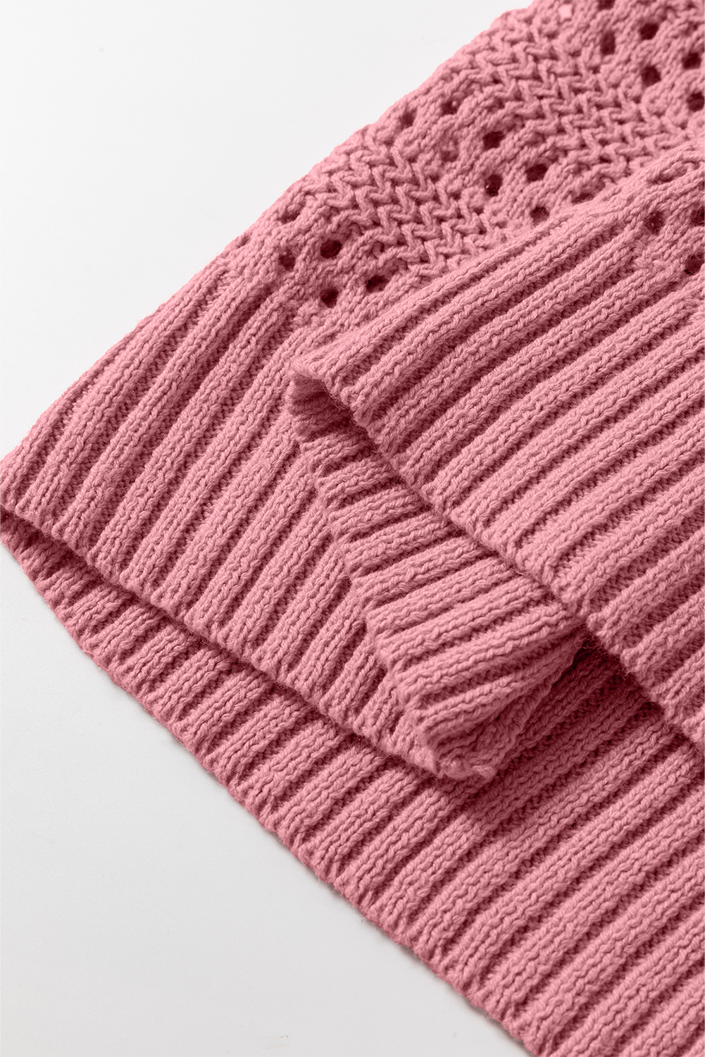 Stay warm and stylish with this Women's Peach Blossom Pointelle Knit Raglan Sleeve Hooded Sweater. The intricate pointelle knit design adds a touch of elegance, while the cozy raglan sleeves provide a comfortable and trendy touch to your outfit. The versatile hooded design with a drawstring is perfect for everyday wear, effortlessly pairing with jeans and flats for a casual look. This sweater is a must-have for a chic and comfortable ensemble, making it perfect for fall and winter seasons. Made from a soft blend of 60% cotton and 40% acrylic, this sweater ensures a cozy fit and easy care. The peach blossom color is a beautiful soft pink hue that complements most skin tones, making it a versatile addition to your wardrobe. - Detail View 9 Stay warm and stylish with this Women's Peach Blossom Pointelle Knit Raglan Sleeve Hooded Sweater. The intricate pointelle knit design adds a touch of elegance, while the cozy raglan sleeves provide a comfortable and trendy touch to your outfit. The versatile hooded design with a drawstring is perfect for everyday wear, effortlessly pairing with jeans and flats for a casual look. This sweater is a must-have for a chic and comfortable ensemble, making it perfect for fall and winter seasons. Made from a soft blend of 60% cotton and 40% acrylic, this sweater ensures a cozy fit and easy care. The peach blossom color is a beautiful soft pink hue that complements most skin tones, making it a versatile addition to your wardrobe. - Detail View 9