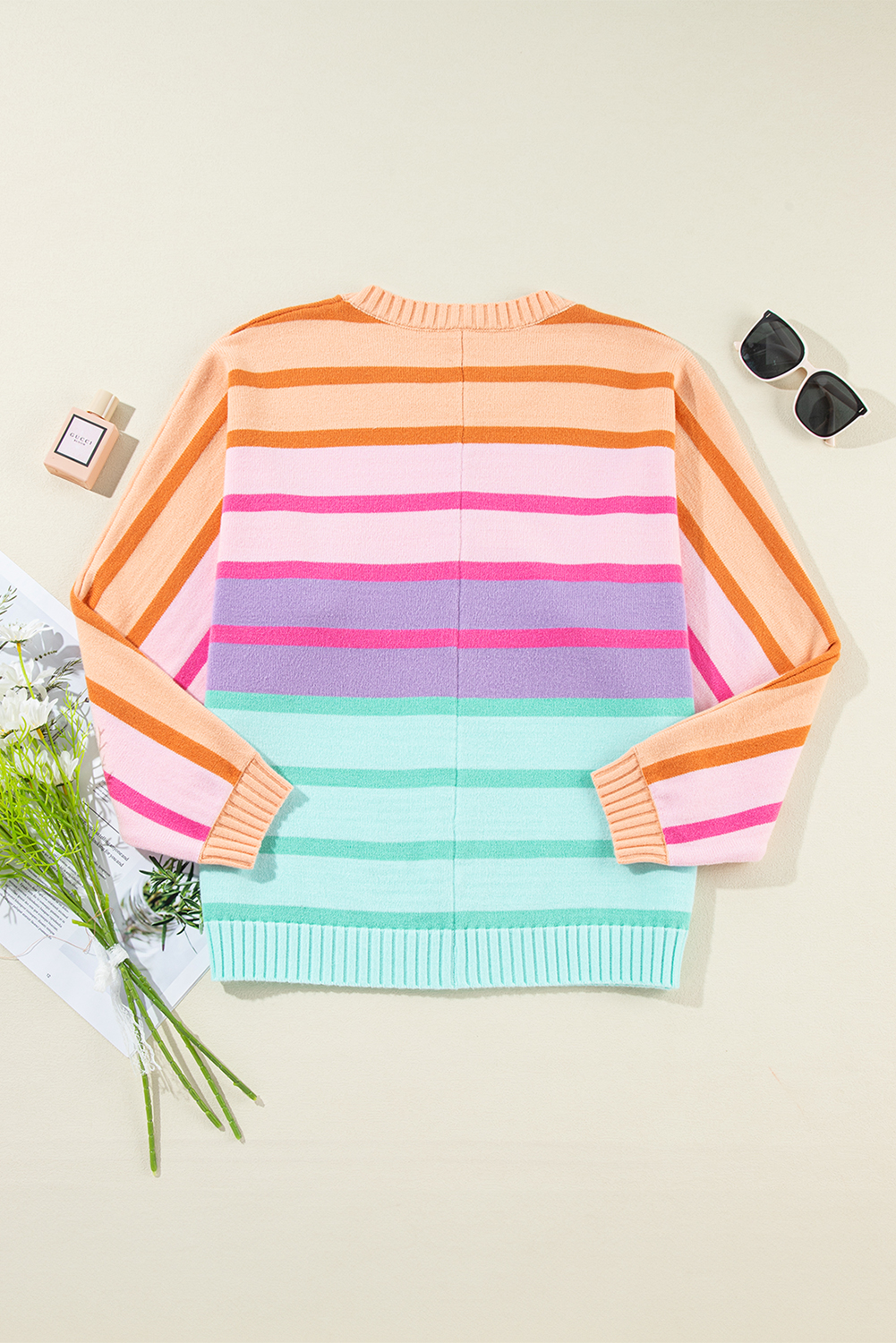 Stay warm and stylish this autumn and winter with our Women's Multicolour Gradient Striped Ribbed Edge Loose Sweater. This cozy knit sweater features a gradient striped silhouette, a loose fit, and bubble sleeves, making it perfect for casual daily wear. The ribbed edge adds a comfortable and soft touch to the sweater. Pair it with your favorite jeans or jumpsuits for a chic and comfortable outfit. Made from a blend of 50% viscose, 28% polyester, and 22% polyamide, this sweater is durable and easy to care for. With its multicolour gradient effect, it's a great addition to your autumn and winter wardrobe, suitable for both daily wear and special occasions. Its casual style makes it easy to dress up or down, and its long sleeves ensure ultimate warmth and comfort. - Detail View 9 Stay warm and stylish this autumn and winter with our Women's Multicolour Gradient Striped Ribbed Edge Loose Sweater. This cozy knit sweater features a gradient striped silhouette, a loose fit, and bubble sleeves, making it perfect for casual daily wear. The ribbed edge adds a comfortable and soft touch to the sweater. Pair it with your favorite jeans or jumpsuits for a chic and comfortable outfit. Made from a blend of 50% viscose, 28% polyester, and 22% polyamide, this sweater is durable and easy to care for. With its multicolour gradient effect, it's a great addition to your autumn and winter wardrobe, suitable for both daily wear and special occasions. Its casual style makes it easy to dress up or down, and its long sleeves ensure ultimate warmth and comfort. - Detail View 9