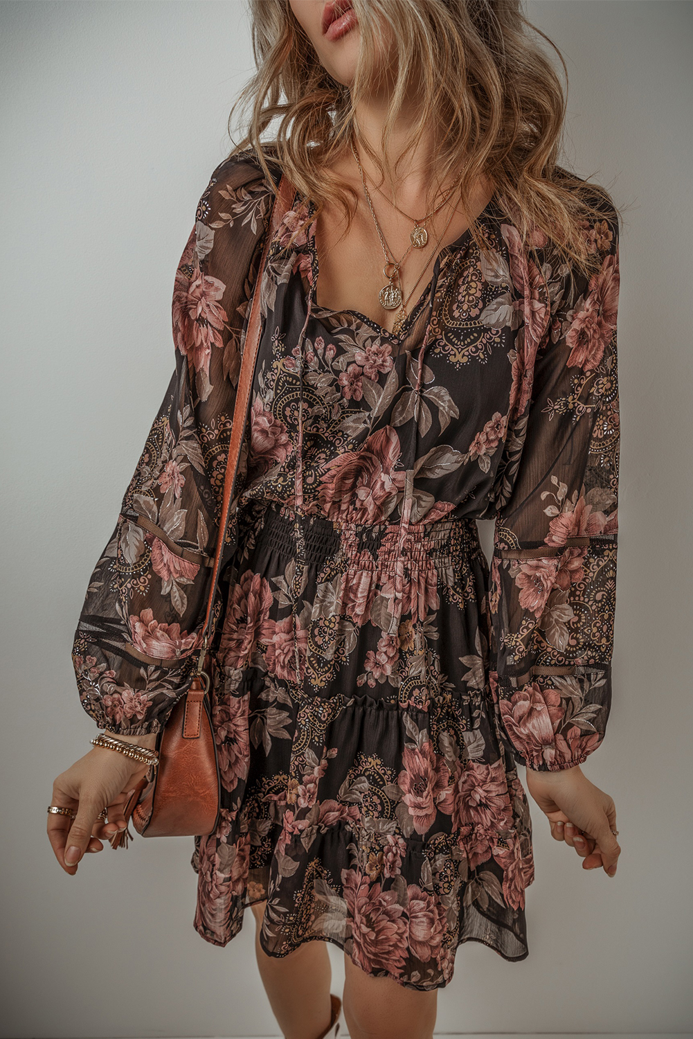 Add a touch of vintage romance to your wardrobe with this lovely Women's Vintage Floral Puff Sleeve V Neck Smock Waist Dress. The delicate floral print and charming aesthetic will make you feel like a ray of sunshine. The smocked waist detail creates a flattering and comfortable fit, while the V neckline adds a hint of elegance and allure. This floral dress is designed to cater to various body types and sizes, making it a must-have addition to your wardrobe. Made from 100% polyester, this dress is easy to care for and perfect for daily wear. Pair it with your favorite accessories and boots for a chic and effortless bohemian look. - Detail View 4 Add a touch of vintage romance to your wardrobe with this lovely Women's Vintage Floral Puff Sleeve V Neck Smock Waist Dress. The delicate floral print and charming aesthetic will make you feel like a ray of sunshine. The smocked waist detail creates a flattering and comfortable fit, while the V neckline adds a hint of elegance and allure. This floral dress is designed to cater to various body types and sizes, making it a must-have addition to your wardrobe. Made from 100% polyester, this dress is easy to care for and perfect for daily wear. Pair it with your favorite accessories and boots for a chic and effortless bohemian look. - Detail View 4