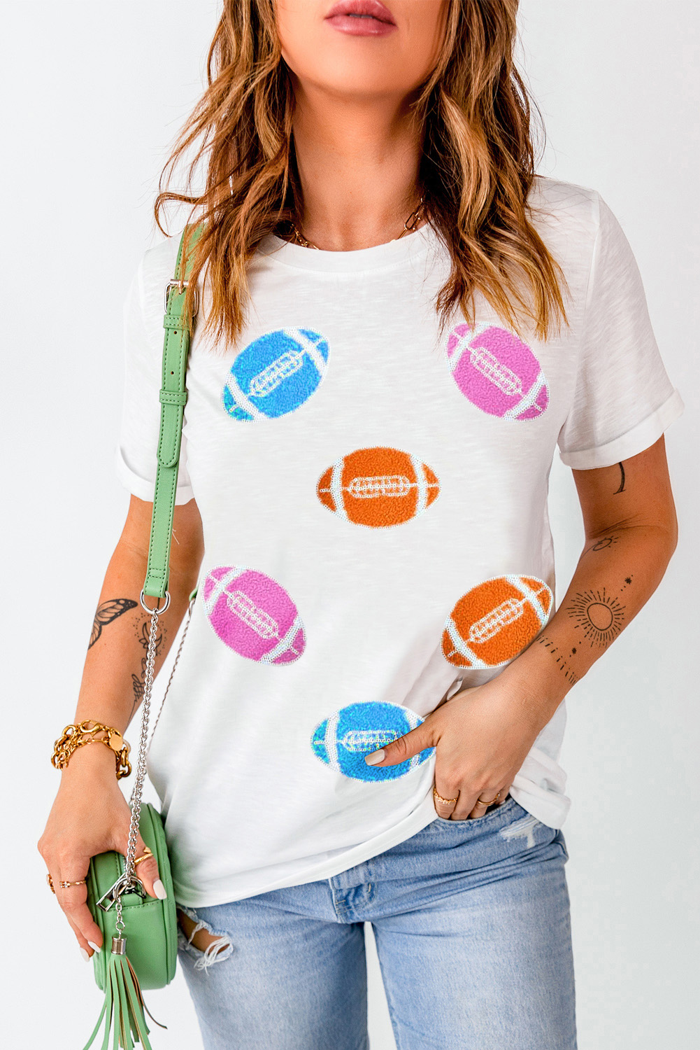 Elevate your casual wear with this Women's White Rugby Chenille Embroidered Crew Neck T-Shirt. The sporty yet sophisticated design makes it a versatile option for daily wear. Chenille embroidery adds a soft and textured touch to the classic rugby-inspired design, adding a touch of elegance. The crew neck and short sleeves provide a timeless and comfortable fit, perfect for summer days. Made from durable fabric, this t-shirt ensures long-lasting wear, making it a practical addition to your wardrobe. Style it with jeans or chinos for a smart casual look, ideal for various occasions. The white color and geometric pattern give a fresh and modern vibe to the t-shirt, making it a stylish choice for the season. - Detail View 4 Elevate your casual wear with this Women's White Rugby Chenille Embroidered Crew Neck T-Shirt. The sporty yet sophisticated design makes it a versatile option for daily wear. Chenille embroidery adds a soft and textured touch to the classic rugby-inspired design, adding a touch of elegance. The crew neck and short sleeves provide a timeless and comfortable fit, perfect for summer days. Made from durable fabric, this t-shirt ensures long-lasting wear, making it a practical addition to your wardrobe. Style it with jeans or chinos for a smart casual look, ideal for various occasions. The white color and geometric pattern give a fresh and modern vibe to the t-shirt, making it a stylish choice for the season. - Detail View 4