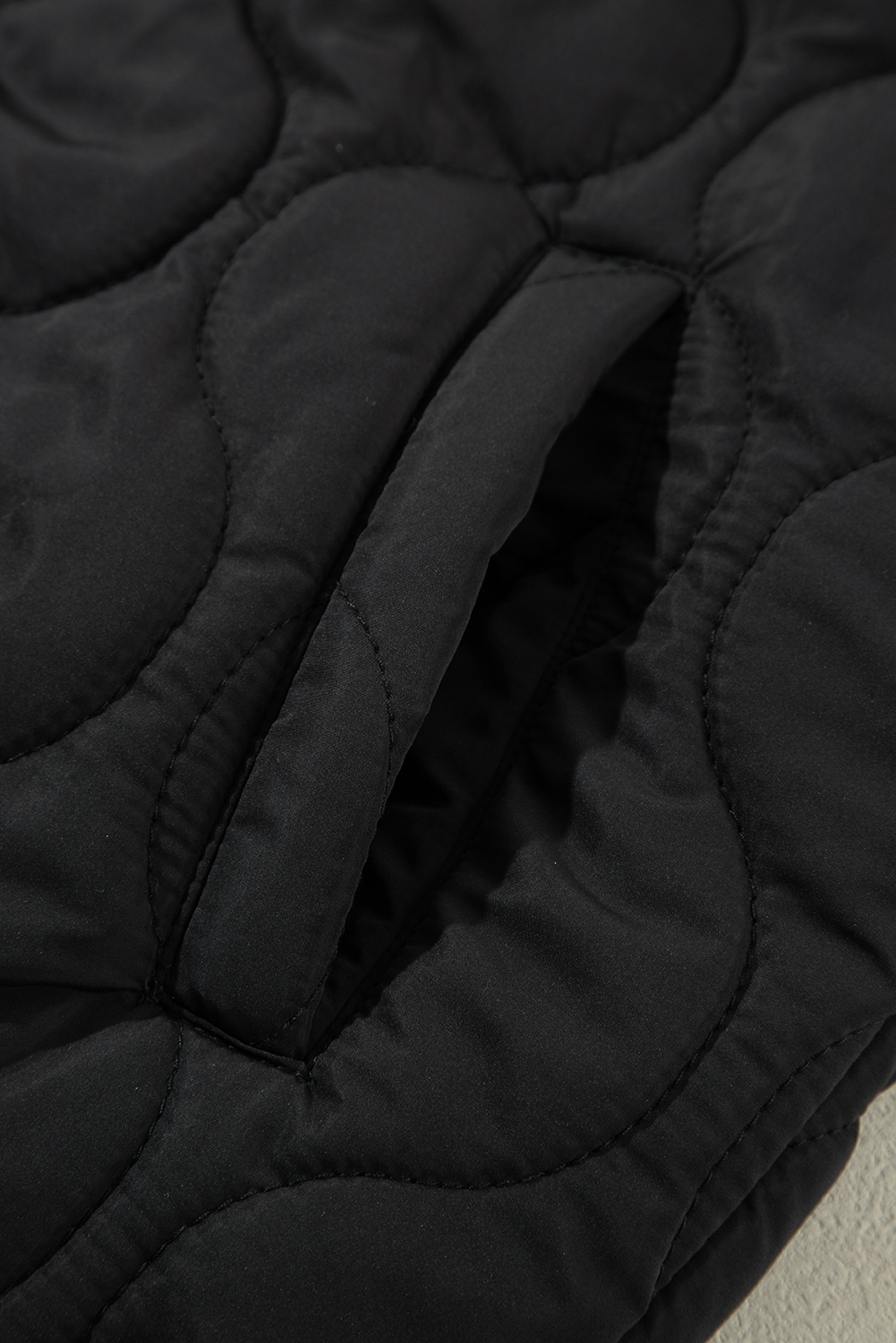 Women's Black Quilted Hooded Zip-Up Puffer Vest - Detail View 11 Women's Black Quilted Hooded Zip-Up Puffer Vest - Detail View 11