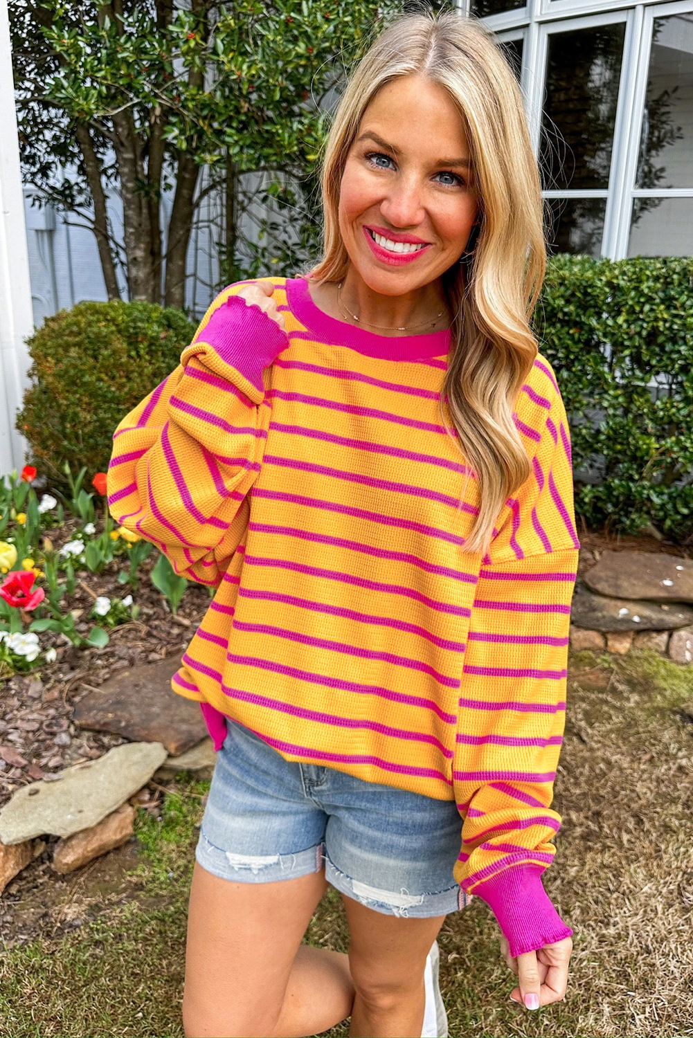 Stay warm and stylish with this Women's Orange Striped Round Neck Drop Shoulder Loose Sweater. The classic striped pattern in orange and rose red adds a pop of color and style to this knit sweater. The relaxed fit and drop shoulder design provide a comfortable and laid-back feel, making it suitable for different body shapes and various occasions. Made from a blend of 50% viscose, 28% polyester, and 22% polyamide, this sweater offers both warmth and breathability. The long sleeves ensure extra coziness, perfect for the fall and autumn season. Pair it with your favorite jeans or leggings for a casual and chic look. This must-have sweater combines fashion and comfort, ideal for daily wear to keep you warm and stylish. - Detail View 9 Stay warm and stylish with this Women's Orange Striped Round Neck Drop Shoulder Loose Sweater. The classic striped pattern in orange and rose red adds a pop of color and style to this knit sweater. The relaxed fit and drop shoulder design provide a comfortable and laid-back feel, making it suitable for different body shapes and various occasions. Made from a blend of 50% viscose, 28% polyester, and 22% polyamide, this sweater offers both warmth and breathability. The long sleeves ensure extra coziness, perfect for the fall and autumn season. Pair it with your favorite jeans or leggings for a casual and chic look. This must-have sweater combines fashion and comfort, ideal for daily wear to keep you warm and stylish. - Detail View 9