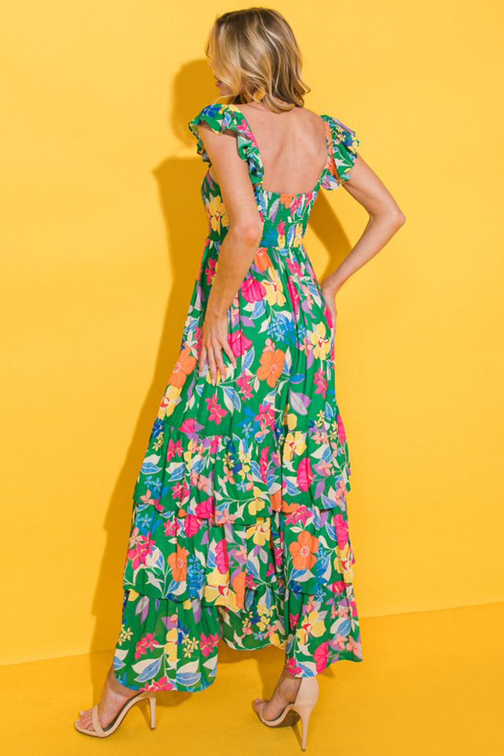Elevate your summer wardrobe with this stunning Women's Bohemian Style Green Floral Print Sleeveless Maxi Dress. This flowy dress is perfect for warm weather or beach outings, showcasing a vibrant and colorful floral pattern that creates a fresh and summery vibe. The ruffled shoulder straps add movement and an extra layer of visual interest, while the high waist design accentuates the curves and creates a feminine silhouette. Made from 100% polyester, this dress offers a comfortable and lightweight feel, making it ideal for daily wear or vacation. The A-line silhouette and long length exude elegance and charm, while the backless design adds a touch of allure to the ensemble. Whether you're headed for a vacation or simply updating your wardrobe, this dress offers versatile styles that are sure to turn heads. - Detail View 4 Elevate your summer wardrobe with this stunning Women's Bohemian Style Green Floral Print Sleeveless Maxi Dress. This flowy dress is perfect for warm weather or beach outings, showcasing a vibrant and colorful floral pattern that creates a fresh and summery vibe. The ruffled shoulder straps add movement and an extra layer of visual interest, while the high waist design accentuates the curves and creates a feminine silhouette. Made from 100% polyester, this dress offers a comfortable and lightweight feel, making it ideal for daily wear or vacation. The A-line silhouette and long length exude elegance and charm, while the backless design adds a touch of allure to the ensemble. Whether you're headed for a vacation or simply updating your wardrobe, this dress offers versatile styles that are sure to turn heads. - Detail View 4