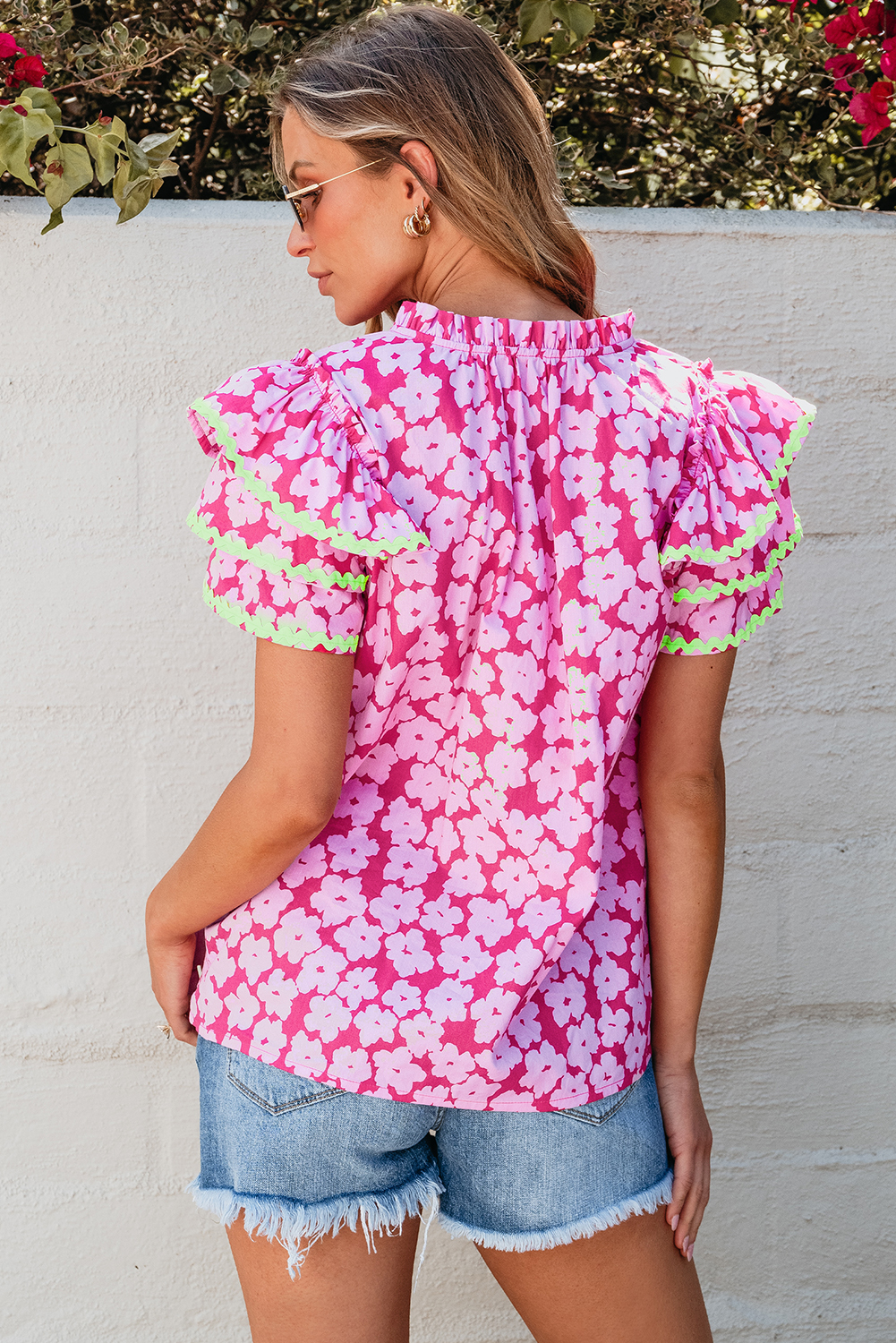 Stylish Short Sleeve Blouse: Pink Floral Print with Tiered Ruffle Detail - Detail View 2 Stylish Short Sleeve Blouse: Pink Floral Print with Tiered Ruffle Detail - Detail View 2