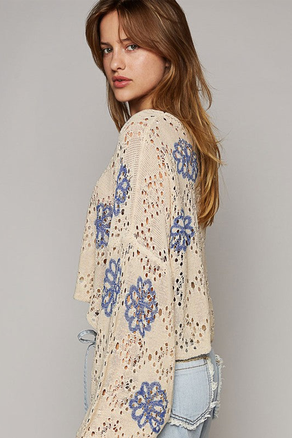 Add a pop of color and style to your wardrobe with this Women's Beige Contrast Flower Print Eyelet Drop Shoulder Sweater. The floral print creates a vibrant and eye-catching look, while the eyelet details add a touch of texture and uniqueness to the sweater. The trendy drop shoulder design gives it a relaxed and chic vibe, perfect for casual outings. The loose fit ensures comfort and effortless style, making it an ideal choice for daily wear. Made from a blend of 55% acrylic and 45% cotton, this sweater provides a lightweight and breathable feel, suitable for the spring season. The captivating patterns and textures make it a standout piece in your collection. Pair it with jeans or shorts for a trendy and comfortable look. Embrace the beauty of spring with this stylish and versatile sweater. - Detail View 4 Add a pop of color and style to your wardrobe with this Women's Beige Contrast Flower Print Eyelet Drop Shoulder Sweater. The floral print creates a vibrant and eye-catching look, while the eyelet details add a touch of texture and uniqueness to the sweater. The trendy drop shoulder design gives it a relaxed and chic vibe, perfect for casual outings. The loose fit ensures comfort and effortless style, making it an ideal choice for daily wear. Made from a blend of 55% acrylic and 45% cotton, this sweater provides a lightweight and breathable feel, suitable for the spring season. The captivating patterns and textures make it a standout piece in your collection. Pair it with jeans or shorts for a trendy and comfortable look. Embrace the beauty of spring with this stylish and versatile sweater. - Detail View 4
