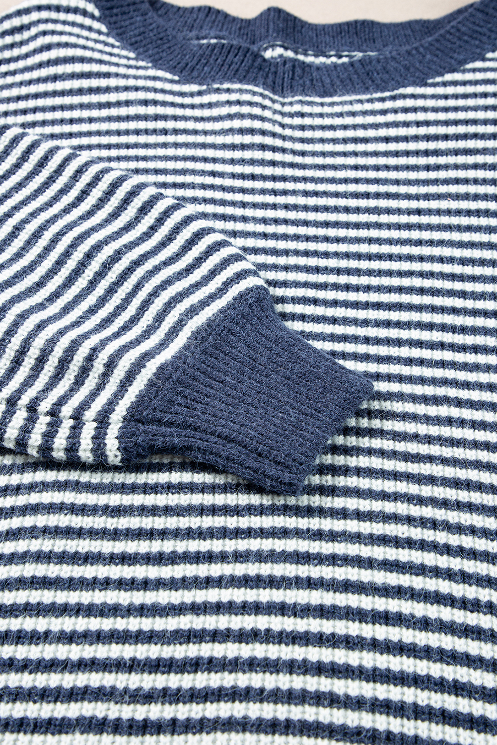 Wrap yourself in comfort and style with this Women's Striped Lantern Sleeve Drop Shoulder Cozy Sweater. The effortlessly chic drop shoulder design gives a trendy and relaxed look, while the fashion forward lantern sleeves add a touch of flair to your outfit. Made from a selective soft material, this sweater ensures all-day comfort and warmth. Perfect for daily wear, this sweater is a must-have for your winter wardrobe. The sail blue striped pattern is a classic and timeless choice, easy to pair with your favorite jeans, leggings, or skirts. Upgrade your casual style with this cozy and versatile sweater. - Detail View 9 Wrap yourself in comfort and style with this Women's Striped Lantern Sleeve Drop Shoulder Cozy Sweater. The effortlessly chic drop shoulder design gives a trendy and relaxed look, while the fashion forward lantern sleeves add a touch of flair to your outfit. Made from a selective soft material, this sweater ensures all-day comfort and warmth. Perfect for daily wear, this sweater is a must-have for your winter wardrobe. The sail blue striped pattern is a classic and timeless choice, easy to pair with your favorite jeans, leggings, or skirts. Upgrade your casual style with this cozy and versatile sweater. - Detail View 9