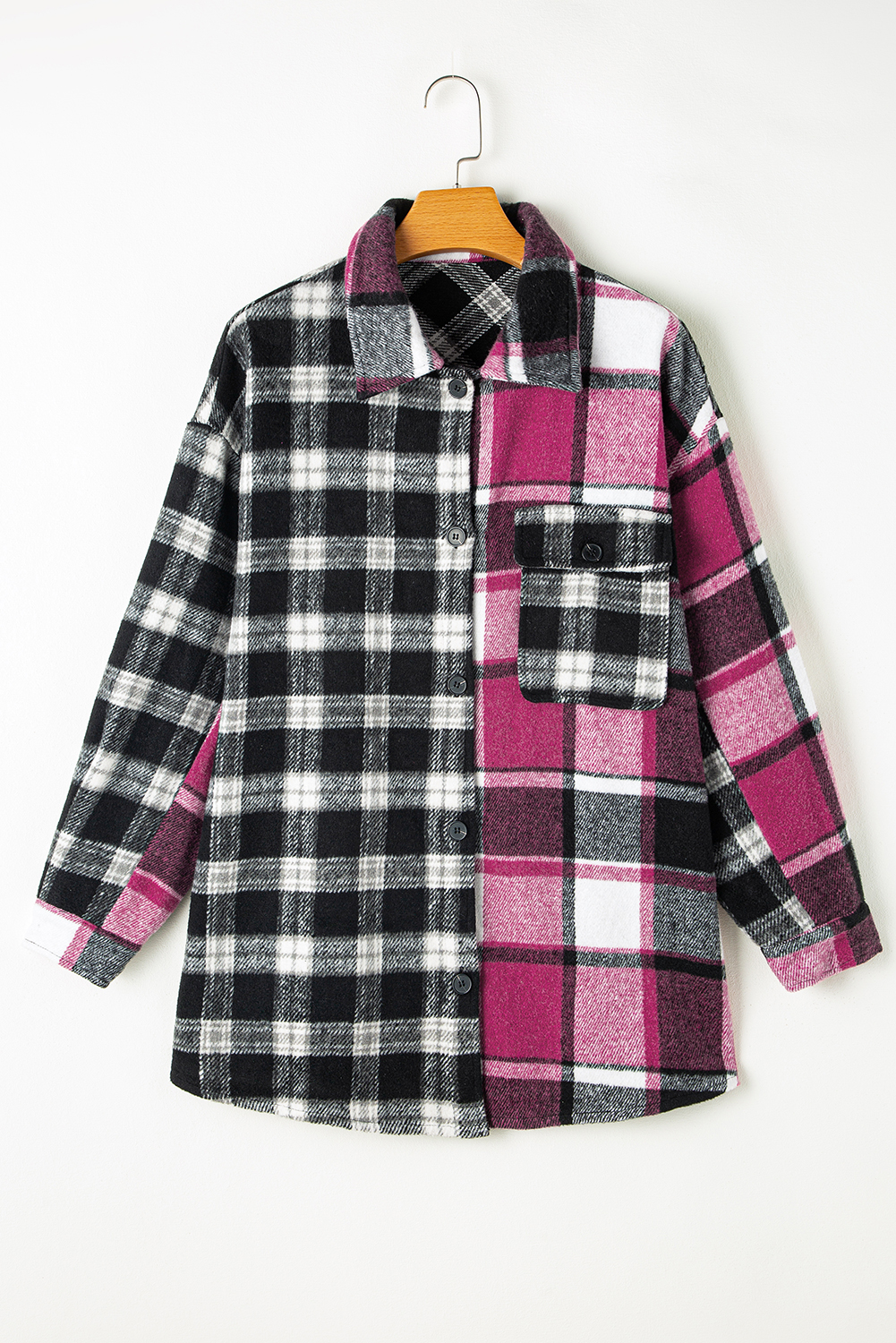 Stay warm and stylish with this Women's Black Plaid Colorblock Loose Fit Shacket. The timeless plaid pattern is combined with vibrant color blocks, creating a unique and eye-catching design. The loose fit and relaxed look make it perfect for daily wear, while the convenient button-up design allows for easy wear. The functional flap pocket adds a touch of utility, making it a practical choice for everyday use. The long sleeves and shift silhouette provide warmth and coverage, making it ideal for fall and autumn wear. This shacket is a must-have for any woman's wardrobe, offering a perfect blend of style, comfort, and practicality. - Detail View 9 Stay warm and stylish with this Women's Black Plaid Colorblock Loose Fit Shacket. The timeless plaid pattern is combined with vibrant color blocks, creating a unique and eye-catching design. The loose fit and relaxed look make it perfect for daily wear, while the convenient button-up design allows for easy wear. The functional flap pocket adds a touch of utility, making it a practical choice for everyday use. The long sleeves and shift silhouette provide warmth and coverage, making it ideal for fall and autumn wear. This shacket is a must-have for any woman's wardrobe, offering a perfect blend of style, comfort, and practicality. - Detail View 9