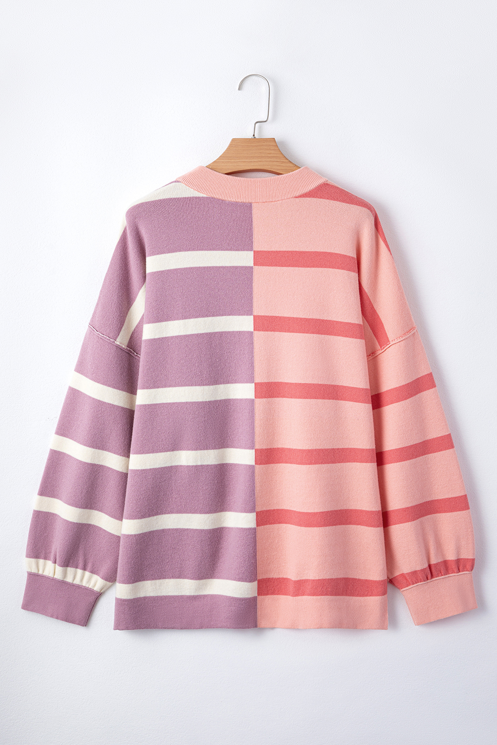 Stay warm and stylish this winter with this Women's Oversized Pink Stripe Colorblock Crew Neck Sweater. The oversized fit makes it perfect for different body shapes, while the stripe and color block designs add a touch of femininity and playfulness to your outfit. The round neck and long sleeves provide a comfortable and practical design. This sweater is versatile and can be paired with any fashion pants, making it a must-have addition to your winter wardrobe. Made from a soft and cozy blend of 50% viscose, 28% polyester, and 22% polyamide, this sweater ensures both warmth and durability. The pink stripe color adds a pop of color to your outfit, perfect for casual daily wear. - Detail View 14 Stay warm and stylish this winter with this Women's Oversized Pink Stripe Colorblock Crew Neck Sweater. The oversized fit makes it perfect for different body shapes, while the stripe and color block designs add a touch of femininity and playfulness to your outfit. The round neck and long sleeves provide a comfortable and practical design. This sweater is versatile and can be paired with any fashion pants, making it a must-have addition to your winter wardrobe. Made from a soft and cozy blend of 50% viscose, 28% polyester, and 22% polyamide, this sweater ensures both warmth and durability. The pink stripe color adds a pop of color to your outfit, perfect for casual daily wear. - Detail View 14