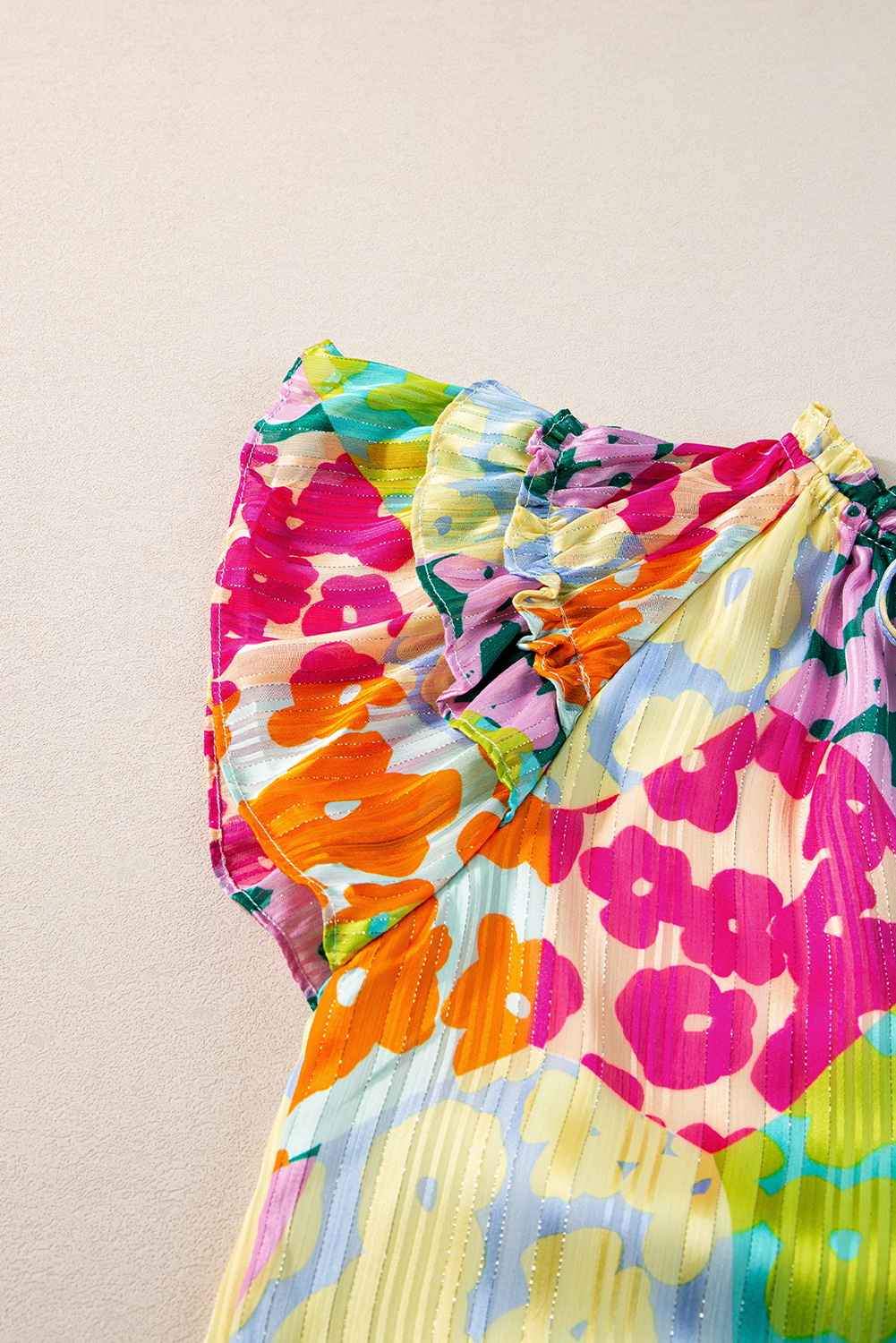 Make a bold fashion statement with this Multicolour Leopard Flutter Sleeve V-Neck Crinkled Blouse. The mix leopard patchwork print is eye-catching and stylish, while the soft lightweight fabric with crinkled textures provides comfort and a unique look. This blouse features a frilly collar, tie split neck, and charming ruffle sleeves, adding a touch of femininity to your ensemble. Create different looks by pairing it with jeans, skirts, or shorts, making it a versatile addition to your wardrobe. Made of high-quality 100% polyester material, this blouse is durable and easy to care for. The elegant V-neckline and cap sleeves enhance the overall appeal, making it suitable for daily wear and special occasions. Embrace your individual style with this chic and elegant blouse. - Detail View 9 Make a bold fashion statement with this Multicolour Leopard Flutter Sleeve V-Neck Crinkled Blouse. The mix leopard patchwork print is eye-catching and stylish, while the soft lightweight fabric with crinkled textures provides comfort and a unique look. This blouse features a frilly collar, tie split neck, and charming ruffle sleeves, adding a touch of femininity to your ensemble. Create different looks by pairing it with jeans, skirts, or shorts, making it a versatile addition to your wardrobe. Made of high-quality 100% polyester material, this blouse is durable and easy to care for. The elegant V-neckline and cap sleeves enhance the overall appeal, making it suitable for daily wear and special occasions. Embrace your individual style with this chic and elegant blouse. - Detail View 9