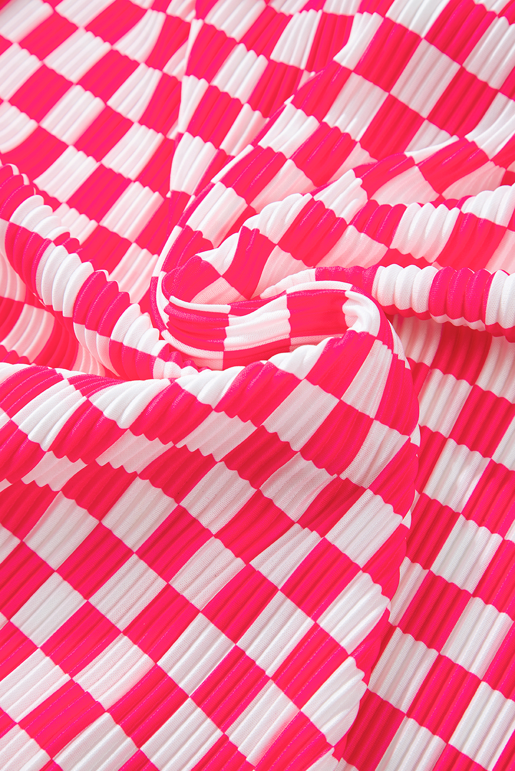Indulge in the comfort and style of this Pink Checkered Buttoned Shirt and High Waist Pants Pajama Set. The classic checkered pattern in pink adds a touch of sophistication to your daily attire. The long-sleeve buttoned shirt provides a versatile styling option, while the high waist pants flatter the figure and elongate the legs. Perfect for lounging around or running errands, this pajama set is ideal for creating a polished and chic outfit. The 100% polyester fabric ensures durability and ease of care. Slip into something comfortable and stylish with this pink checkered pajama set for women. - Detail View 14 Indulge in the comfort and style of this Pink Checkered Buttoned Shirt and High Waist Pants Pajama Set. The classic checkered pattern in pink adds a touch of sophistication to your daily attire. The long-sleeve buttoned shirt provides a versatile styling option, while the high waist pants flatter the figure and elongate the legs. Perfect for lounging around or running errands, this pajama set is ideal for creating a polished and chic outfit. The 100% polyester fabric ensures durability and ease of care. Slip into something comfortable and stylish with this pink checkered pajama set for women. - Detail View 14
