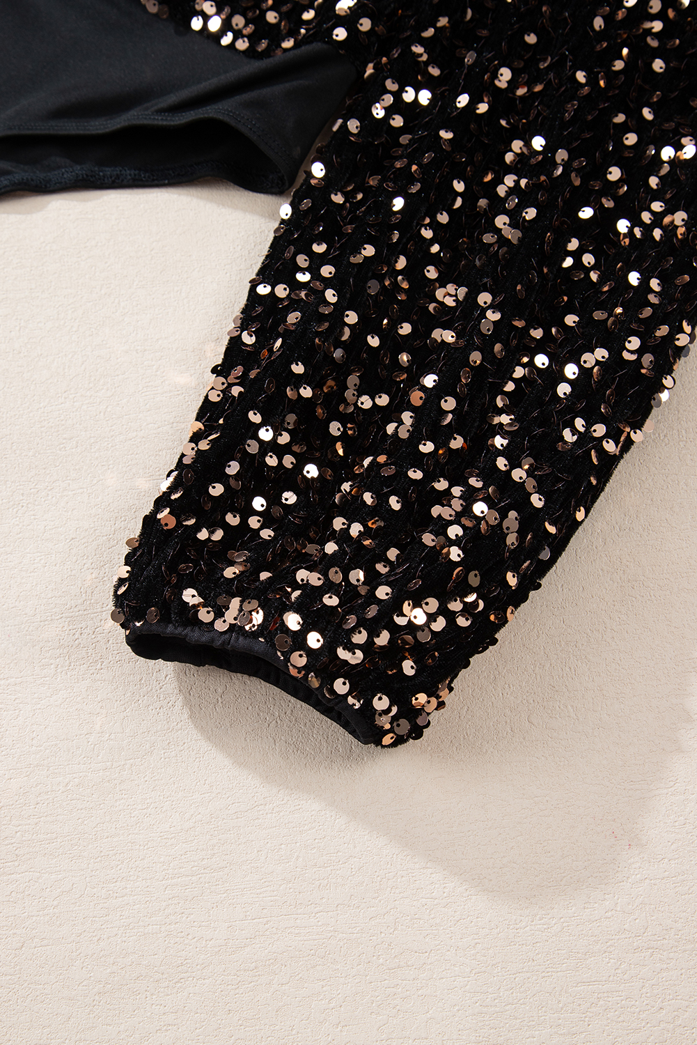 Make a Statement with this Elegant Black Sequin Bodysuit - Deep V Back and Puff Sleeves - Detail View 12 Make a Statement with this Elegant Black Sequin Bodysuit - Deep V Back and Puff Sleeves - Detail View 12