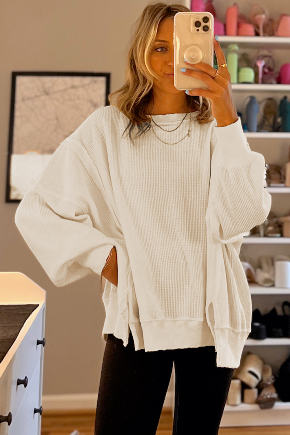 Cozy and Stylish: White Waffle Knit Split Sweatshirt with Bishop Sleeves - Detail View 2 Cozy and Stylish: White Waffle Knit Split Sweatshirt with Bishop Sleeves - Detail View 2