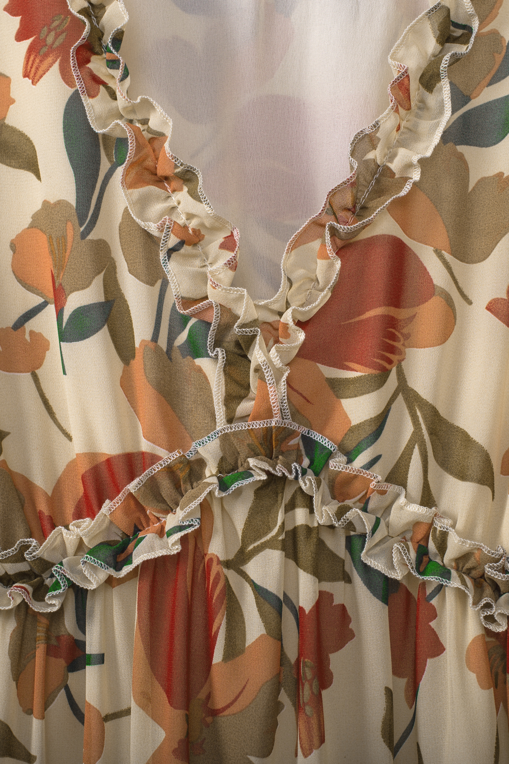 Steal the show in our Women's Wild Lotus Ruffle Tiered Maxi Dress, a stunning addition to your wardrobe. This maxi dress features a unique and eye-catching floral print, perfect for making a statement at any event. Designed with a plunging neckline, long sleeves with elastic cuffs, and an elastic waistband, this dress offers a flattering and comfortable fit. The ruffle trimming adds a touch of sweetness to the overall style, making it a must-have bohemian-inspired piece. Whether you're attending a wedding or going on a vacation, this dress is the perfect choice for a stylish and chic look. Embrace the beauty of spring and early fall with this versatile and fashionable dress. Find your next party outfit from our collection of amazing styles. - Detail View 14 Steal the show in our Women's Wild Lotus Ruffle Tiered Maxi Dress, a stunning addition to your wardrobe. This maxi dress features a unique and eye-catching floral print, perfect for making a statement at any event. Designed with a plunging neckline, long sleeves with elastic cuffs, and an elastic waistband, this dress offers a flattering and comfortable fit. The ruffle trimming adds a touch of sweetness to the overall style, making it a must-have bohemian-inspired piece. Whether you're attending a wedding or going on a vacation, this dress is the perfect choice for a stylish and chic look. Embrace the beauty of spring and early fall with this versatile and fashionable dress. Find your next party outfit from our collection of amazing styles. - Detail View 14