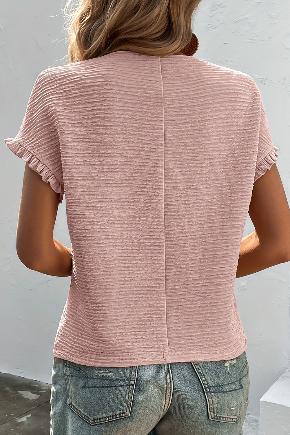 Elevate your style effortlessly with this pretty Women's Elegant Light Pink Ruffled Short Sleeve Blouse. The exquisite texture adds a touch of sophistication, while the short sleeves with ruffled details provide a chic and comfortable fit. The versatile solid color pairs perfectly with different bottoms, making it suitable for various occasions. Embrace elegance with this stylish and modern blouse that is perfect for daily wear. Made from 95% polyester and 5% elastane, this blouse offers both style and comfort, making it an essential addition to your wardrobe. Whether you're going for a casual or dressy look, this elegant blouse is sure to become a wardrobe favorite. - Detail View 4 Elevate your style effortlessly with this pretty Women's Elegant Light Pink Ruffled Short Sleeve Blouse. The exquisite texture adds a touch of sophistication, while the short sleeves with ruffled details provide a chic and comfortable fit. The versatile solid color pairs perfectly with different bottoms, making it suitable for various occasions. Embrace elegance with this stylish and modern blouse that is perfect for daily wear. Made from 95% polyester and 5% elastane, this blouse offers both style and comfort, making it an essential addition to your wardrobe. Whether you're going for a casual or dressy look, this elegant blouse is sure to become a wardrobe favorite. - Detail View 4