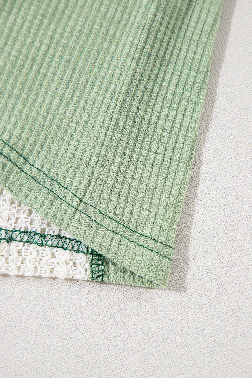 Vintage-Inspired Crochet Detail Knit Top with Exposed Seam and Raw Hemline - Detail View 7 Vintage-Inspired Crochet Detail Knit Top with Exposed Seam and Raw Hemline - Detail View 7