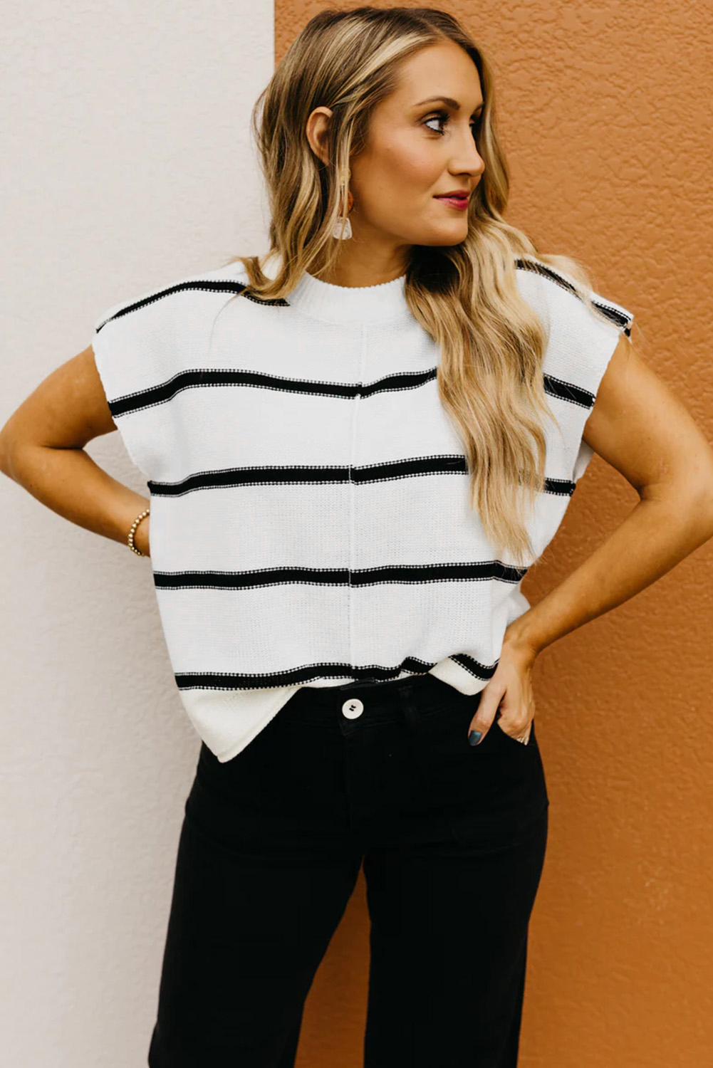Elevate your casual wardrobe with this classic and fashionable Women's White Striped Batwing Sleeve Sweater Tee. The striped style, crew neck, and batwing sleeves give this tee a stylish and modern look, perfect for everyday wear. The loose fit provides comfort and ease of movement, while the soft and breathable 100% acrylic material ensures cozy wearing all day long. This versatile sweater tee pairs well with jeans, skirts, and shorts, making it a must-have addition to your collection. Stay on-trend and comfortable with the latest fashion from Clothes. - Detail View 9 Elevate your casual wardrobe with this classic and fashionable Women's White Striped Batwing Sleeve Sweater Tee. The striped style, crew neck, and batwing sleeves give this tee a stylish and modern look, perfect for everyday wear. The loose fit provides comfort and ease of movement, while the soft and breathable 100% acrylic material ensures cozy wearing all day long. This versatile sweater tee pairs well with jeans, skirts, and shorts, making it a must-have addition to your collection. Stay on-trend and comfortable with the latest fashion from Clothes. - Detail View 9