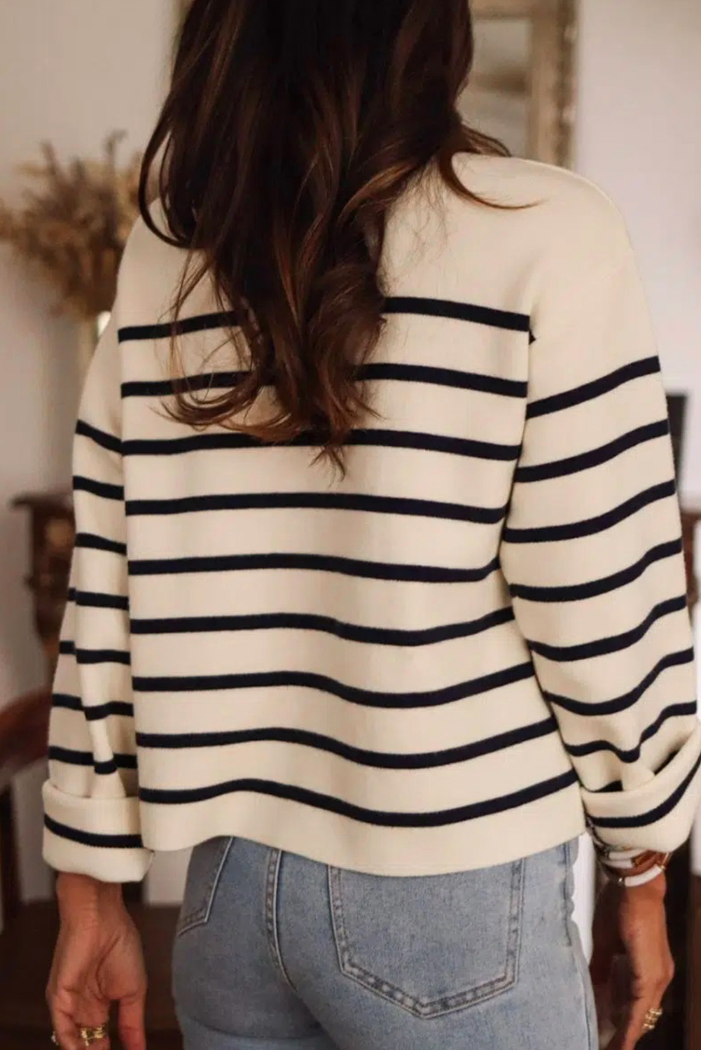 Make a statement with this Women's Classic Black Stripe Flap Pocket Buttoned Cardigan Sweater. The classic striped pattern adds a timeless touch, while the flap pockets provide both style and functionality. The buttoned front allows for easy fastening and an adjustable fit, making it perfect for ladies of all ages. Pair it with your favorite pants or skirts for a chic and elegant look. This cardigan is a must-have addition to your winter wardrobe, offering both modernity and timelessness. - Detail View 9 Make a statement with this Women's Classic Black Stripe Flap Pocket Buttoned Cardigan Sweater. The classic striped pattern adds a timeless touch, while the flap pockets provide both style and functionality. The buttoned front allows for easy fastening and an adjustable fit, making it perfect for ladies of all ages. Pair it with your favorite pants or skirts for a chic and elegant look. This cardigan is a must-have addition to your winter wardrobe, offering both modernity and timelessness. - Detail View 9