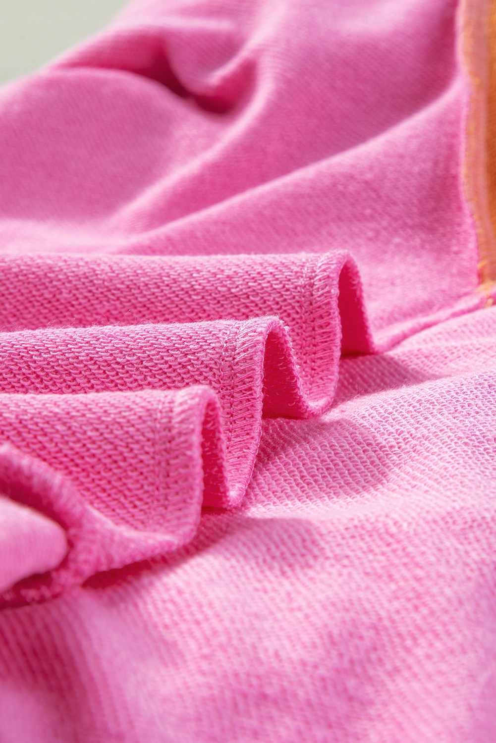 Make a statement with this vibrant Pink Candy Colorblock French Terry Top, designed to add a pop of color to your everyday look. Featuring a unique colorblock design, this playful top offers a chic and effortless way to elevate your style. The long sleeves provide extra coverage and comfort, while the round neckline and shift silhouette ensure a flattering fit. Whether paired with jeans or a skirt, this top is perfect for creating a versatile and stylish ensemble. With its 65% polyester and 35% cotton construction, this top is both durable and soft to the touch. Add this colorful top to your wardrobe for a unique and eye-catching addition. - Detail View 9 Make a statement with this vibrant Pink Candy Colorblock French Terry Top, designed to add a pop of color to your everyday look. Featuring a unique colorblock design, this playful top offers a chic and effortless way to elevate your style. The long sleeves provide extra coverage and comfort, while the round neckline and shift silhouette ensure a flattering fit. Whether paired with jeans or a skirt, this top is perfect for creating a versatile and stylish ensemble. With its 65% polyester and 35% cotton construction, this top is both durable and soft to the touch. Add this colorful top to your wardrobe for a unique and eye-catching addition. - Detail View 9