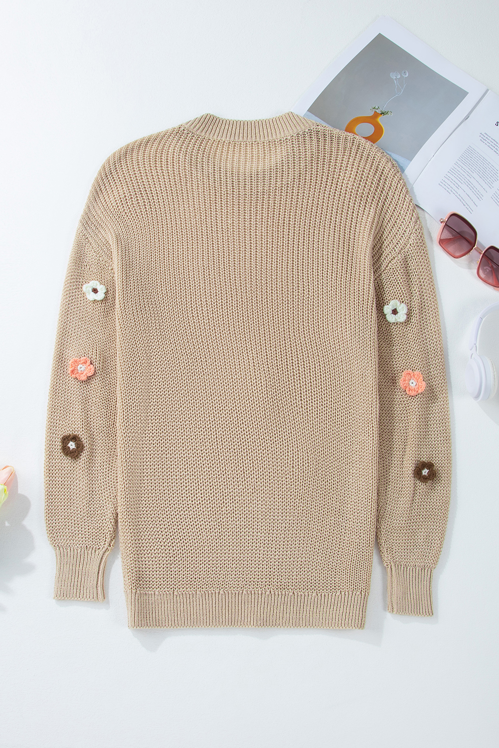 Stay warm and stylish all season round with this Women's Parchment Hello Floral Embroidered Knit Loose Sweater. The lightweight and loose fit design makes it perfect for casual daily wear, while the unique and feminine floral embroidered hello design adds a touch of charm to the sweater. The longline silhouette ensures a flattering fit, and the round neckline and long sleeves provide coverage and comfort. Pair it with leggings or jeans for a chic and effortless look. This sweater is a must-have for your autumn and fall wardrobe, offering both style and comfort. - Detail View 4 Stay warm and stylish all season round with this Women's Parchment Hello Floral Embroidered Knit Loose Sweater. The lightweight and loose fit design makes it perfect for casual daily wear, while the unique and feminine floral embroidered hello design adds a touch of charm to the sweater. The longline silhouette ensures a flattering fit, and the round neckline and long sleeves provide coverage and comfort. Pair it with leggings or jeans for a chic and effortless look. This sweater is a must-have for your autumn and fall wardrobe, offering both style and comfort. - Detail View 4