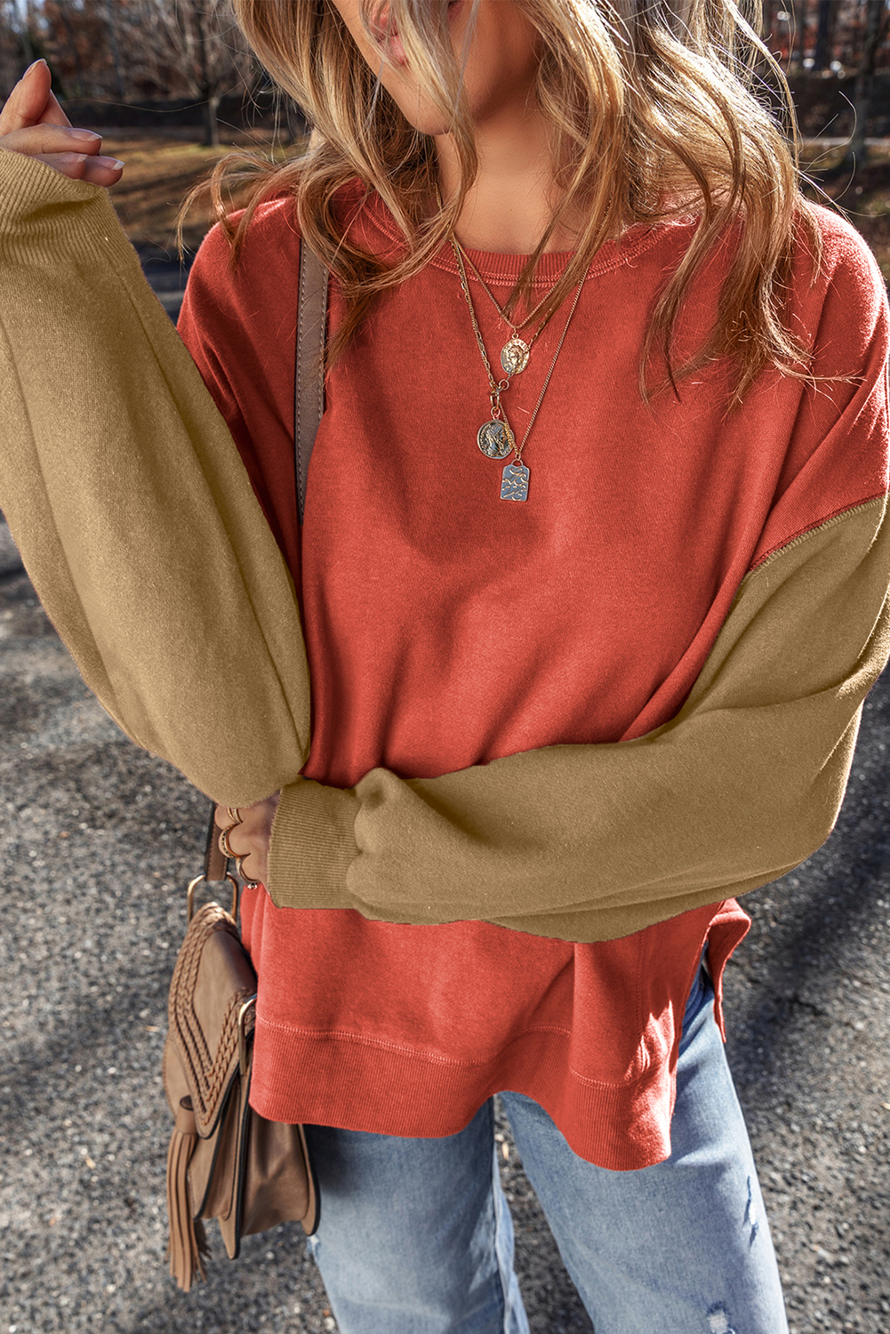Stay warm and stylish with this Women's Gold Flame Two Tone Patchwork Drop Shoulder Pullover Sweatshirt. The patchwork construction adds a touch of personality to your outfit, while the two-tone color scheme is effortlessly fashionable and versatile. The drop shoulder design provides a relaxed fit, ensuring you feel comfortable and at ease. Whether you're running errands, lounging at home, or just want a casual look, this sweatshirt is perfect for daily wear. Made from a soft blend of 50% polyester and 50% cotton, this sweatshirt is not only stylish but also cozy and comfortable. - Detail View 4 Stay warm and stylish with this Women's Gold Flame Two Tone Patchwork Drop Shoulder Pullover Sweatshirt. The patchwork construction adds a touch of personality to your outfit, while the two-tone color scheme is effortlessly fashionable and versatile. The drop shoulder design provides a relaxed fit, ensuring you feel comfortable and at ease. Whether you're running errands, lounging at home, or just want a casual look, this sweatshirt is perfect for daily wear. Made from a soft blend of 50% polyester and 50% cotton, this sweatshirt is not only stylish but also cozy and comfortable. - Detail View 4