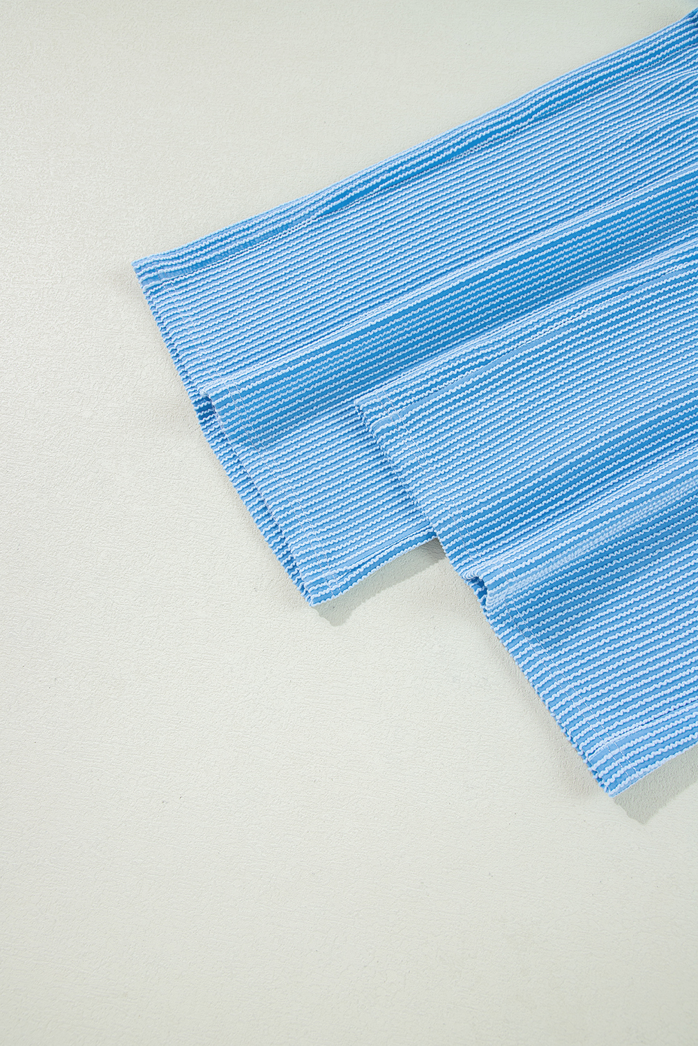 Stylish Blue Short Sleeve T-Shirt with High-Waisted Wide Leg Pants - Perfect for Summer - Detail View 15 Stylish Blue Short Sleeve T-Shirt with High-Waisted Wide Leg Pants - Perfect for Summer - Detail View 15