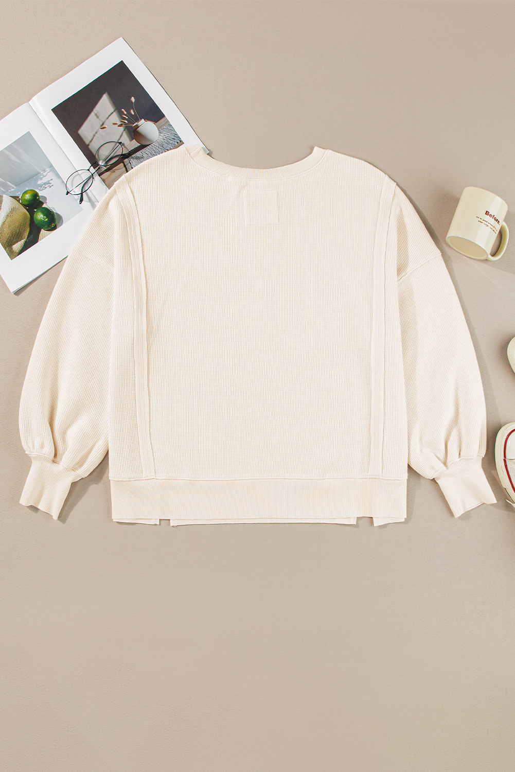 Cozy and Stylish: White Waffle Knit Split Sweatshirt with Bishop Sleeves - Detail View 7 Cozy and Stylish: White Waffle Knit Split Sweatshirt with Bishop Sleeves - Detail View 7