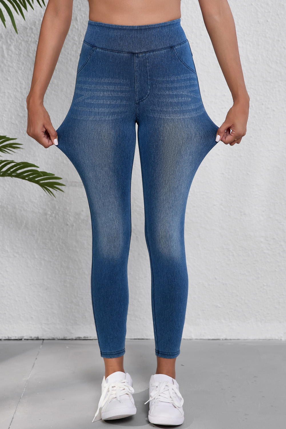 Elevate your daily style with these Navy Blue Women's Skinny Jeggings with Pockets. The full elastic waistband and comfortable, skinny fit design ensure a smooth and effortless pull-on experience. The ankle length of these jeggings provides a vibrant and on-trend look, while the functional pockets offer practical storage for your essentials. Made from a blend of 47% polyester, 42% cotton, and 11% elastane, these jeggings are durable and easy to care for. Pair them with your favorite tops and boots for a chic and comfortable outfit. You'll love the affordable price and excellent quality of these women's leggings. - Detail View 4 Elevate your daily style with these Navy Blue Women's Skinny Jeggings with Pockets. The full elastic waistband and comfortable, skinny fit design ensure a smooth and effortless pull-on experience. The ankle length of these jeggings provides a vibrant and on-trend look, while the functional pockets offer practical storage for your essentials. Made from a blend of 47% polyester, 42% cotton, and 11% elastane, these jeggings are durable and easy to care for. Pair them with your favorite tops and boots for a chic and comfortable outfit. You'll love the affordable price and excellent quality of these women's leggings. - Detail View 4