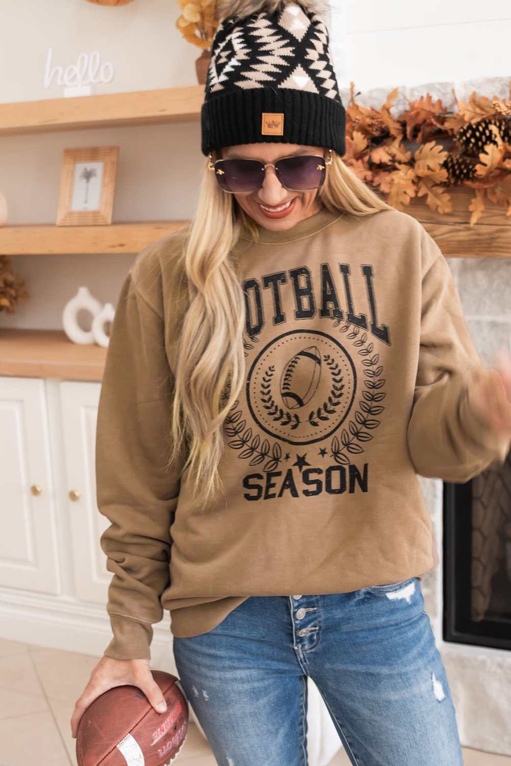 Get ready to show your team spirit with this Khaki Rugby Graphic Sweatshirt! Featuring bold lettering that reads 'FOOTBALL SEASON', this sweatshirt is perfect for game day excitement. With a relaxed fit, you'll have ease of movement and a cozy feel throughout the match. Pair it with your favorite team gear for a stylish and spirited outfit. Made from warm and comfortable material, this graphic sweatshirt ensures you'll stay warm and toasty, even when the game gets intense. Perfect for die-hard rugby fans, this sweatshirt is a must-have addition to your game day wardrobe. - Detail View 4 Get ready to show your team spirit with this Khaki Rugby Graphic Sweatshirt! Featuring bold lettering that reads 'FOOTBALL SEASON', this sweatshirt is perfect for game day excitement. With a relaxed fit, you'll have ease of movement and a cozy feel throughout the match. Pair it with your favorite team gear for a stylish and spirited outfit. Made from warm and comfortable material, this graphic sweatshirt ensures you'll stay warm and toasty, even when the game gets intense. Perfect for die-hard rugby fans, this sweatshirt is a must-have addition to your game day wardrobe. - Detail View 4