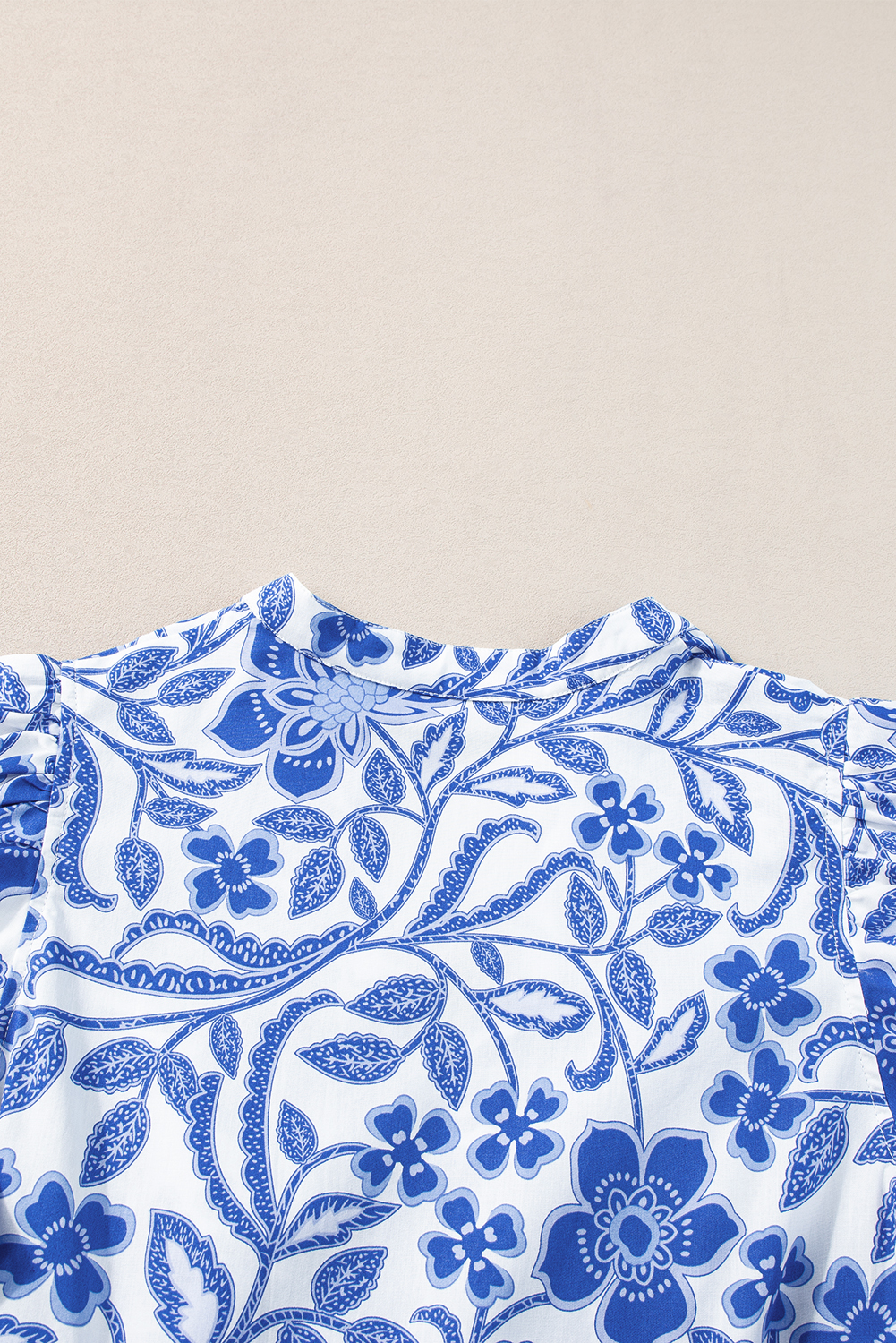 Make a statement with this Women's Blue Floral Print Puff Sleeve Tiered Mini Dress. The delicate flower print on a lightweight and breathable fabric creates an elegant and charming look, flattering to show off your good skin tone. The tiered design with puff sleeves adds volume and a flattering silhouette, making it perfect for both casual outings and special occasions. The high waist line ensures a comfortable and secure fit. Pair it with sandals for a relaxed daytime look or dress it up with heeled sandals for a glamorous evening ensemble. This Mini Dress is a must-have addition to your wardrobe, featuring attractive prices and delicate cuttings. - Detail View 9 Make a statement with this Women's Blue Floral Print Puff Sleeve Tiered Mini Dress. The delicate flower print on a lightweight and breathable fabric creates an elegant and charming look, flattering to show off your good skin tone. The tiered design with puff sleeves adds volume and a flattering silhouette, making it perfect for both casual outings and special occasions. The high waist line ensures a comfortable and secure fit. Pair it with sandals for a relaxed daytime look or dress it up with heeled sandals for a glamorous evening ensemble. This Mini Dress is a must-have addition to your wardrobe, featuring attractive prices and delicate cuttings. - Detail View 9