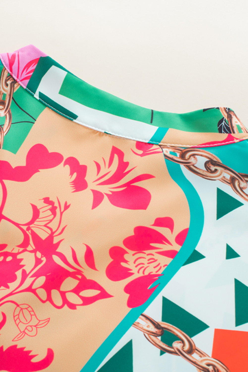 Trendy Abstract Printed Mini Dress: Multicoloured Design with Elegant Notched Neck & Flattering Half Sleeves - Detail View 12 Trendy Abstract Printed Mini Dress: Multicoloured Design with Elegant Notched Neck & Flattering Half Sleeves - Detail View 12