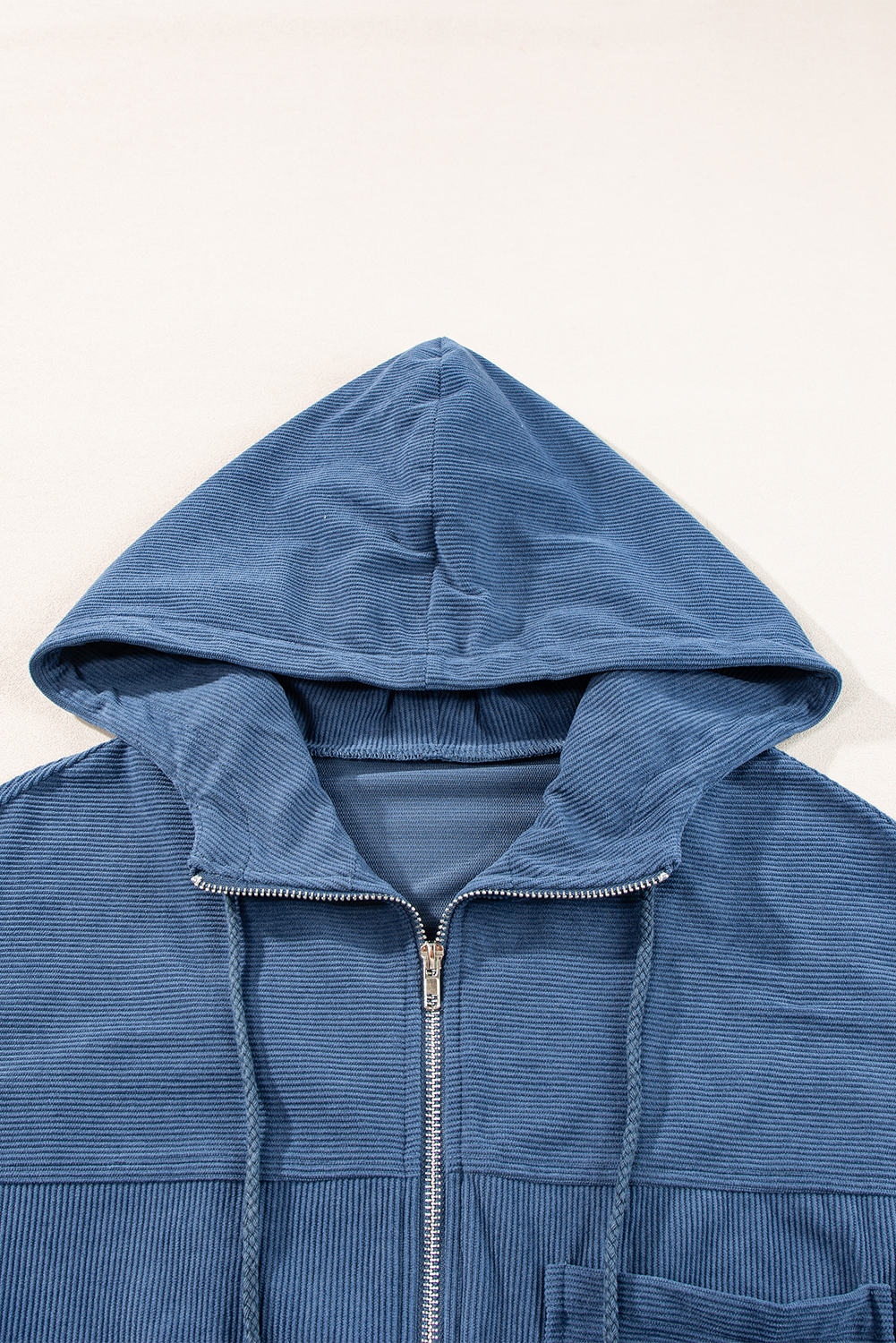 Add a touch of vintage trendiness to your outerwear collection with this Women's Real Teal Corduroy Drawstring Hooded Zip-Up Jacket. The corduroy fabric gives the jacket a trendy vintage look, while the hooded design with a drawstring offers both style and function. The functional zip-up feature ensures easy wearability and adds to the jacket's overall stylish and versatile appeal. Made from premium 100% polyester, this jacket is durable and comfortable to wear. The real teal color adds a pop of color to your fall/autumn wardrobe, making it a standout piece. The long sleeves provide warmth and coverage, making it suitable for the cooler seasons. Pair this stylish and versatile jacket with any bottoms for a chic and trendy look that is perfect for various occasions. Elevate your outerwear game with this must-have jacket for fashion-forward women. - Detail View 9 Add a touch of vintage trendiness to your outerwear collection with this Women's Real Teal Corduroy Drawstring Hooded Zip-Up Jacket. The corduroy fabric gives the jacket a trendy vintage look, while the hooded design with a drawstring offers both style and function. The functional zip-up feature ensures easy wearability and adds to the jacket's overall stylish and versatile appeal. Made from premium 100% polyester, this jacket is durable and comfortable to wear. The real teal color adds a pop of color to your fall/autumn wardrobe, making it a standout piece. The long sleeves provide warmth and coverage, making it suitable for the cooler seasons. Pair this stylish and versatile jacket with any bottoms for a chic and trendy look that is perfect for various occasions. Elevate your outerwear game with this must-have jacket for fashion-forward women. - Detail View 9