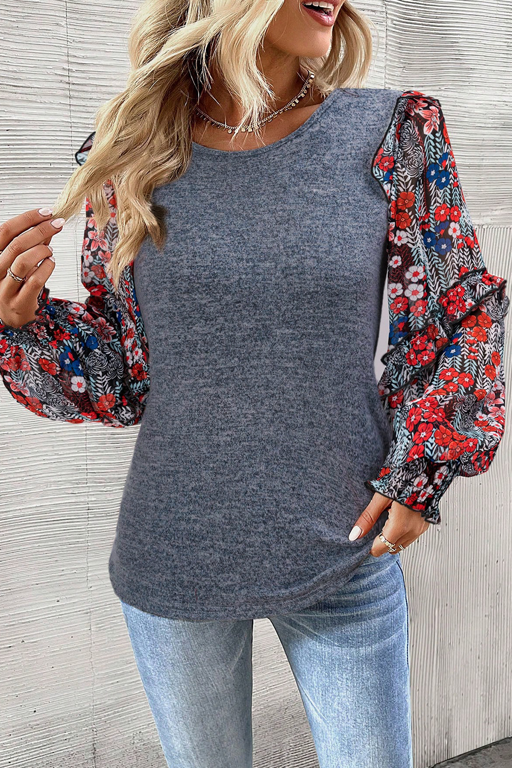 Elevate your style with this charming Women's Blue Ruffle Tiered Floral Sleeve Crew Neck Blouse. The playful ruffle detailing along the sleeves creates a flirtatious and romantic vibe, while the puff sleeves add a touch of elegance and femininity. The patchwork and floral pattern adds a modern twist to this classic blouse, making it a standout piece in your wardrobe. Pair it with your favorite trousers or skirt for a sophisticated and stylish outfit. This blouse is perfect for date nights, work events, or daily wear, offering versatility and a dash of whimsy. - Detail View 4 Elevate your style with this charming Women's Blue Ruffle Tiered Floral Sleeve Crew Neck Blouse. The playful ruffle detailing along the sleeves creates a flirtatious and romantic vibe, while the puff sleeves add a touch of elegance and femininity. The patchwork and floral pattern adds a modern twist to this classic blouse, making it a standout piece in your wardrobe. Pair it with your favorite trousers or skirt for a sophisticated and stylish outfit. This blouse is perfect for date nights, work events, or daily wear, offering versatility and a dash of whimsy. - Detail View 4
