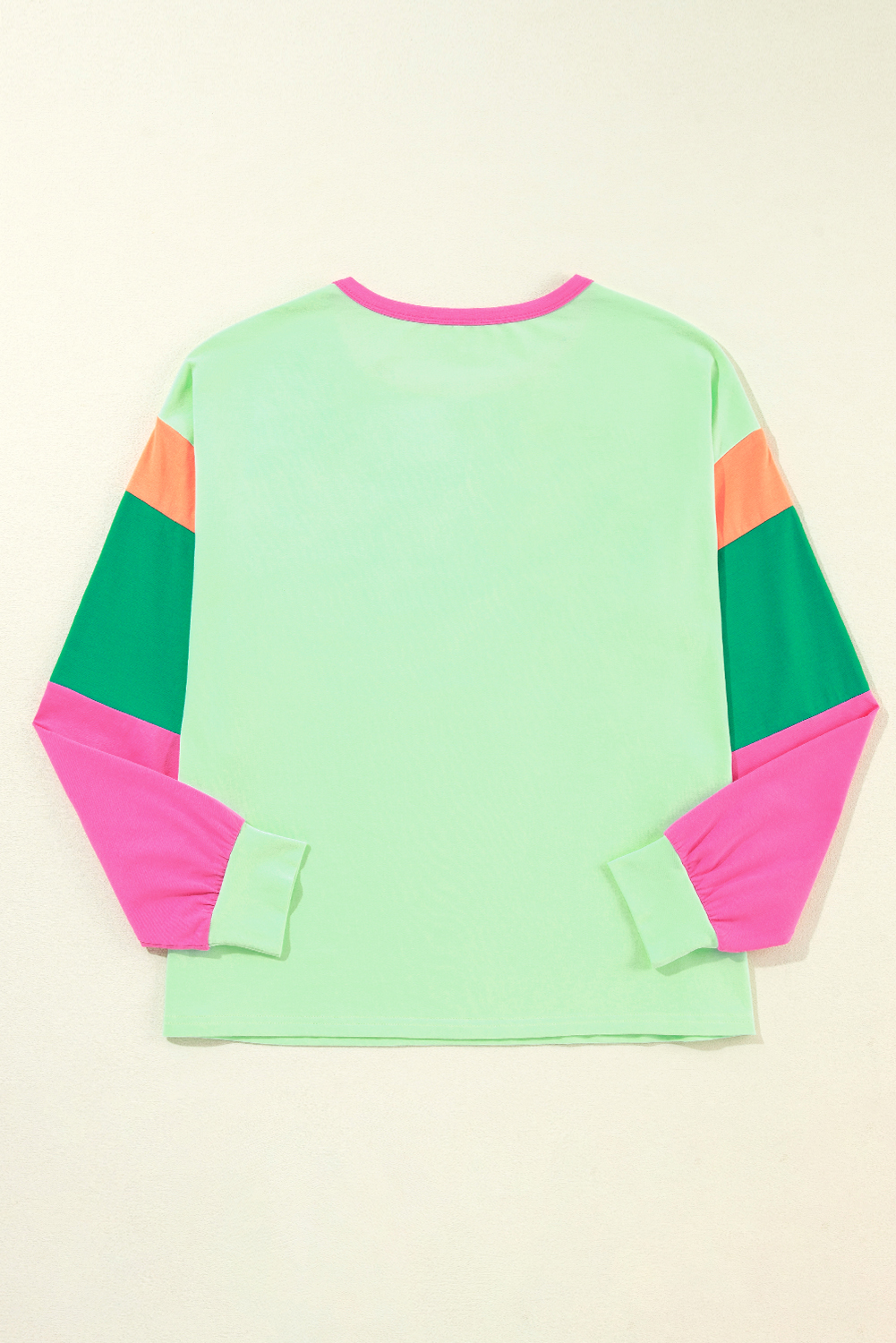Add a timeless and versatile piece to your wardrobe with this Women's Green Colorblock Patchwork Long Sleeve Loose Top. The crew neck top offers a classic and adaptable look, while the eye-catching colorblock patchwork design adds a modern and unique touch to your style. The long sleeves provide coverage and warmth for cooler days, making it suitable for the spring season. The loose fit ensures a comfortable and relaxed silhouette that flatters all body types, catering to various body shapes and sizes. Made from premium 95% cotton and 5% elastane, this top offers both durability and stretch for all-day comfort. Perfect for daily wear, this casual top is a best-seller and a must-have addition to your wardrobe. - Detail View 4 Add a timeless and versatile piece to your wardrobe with this Women's Green Colorblock Patchwork Long Sleeve Loose Top. The crew neck top offers a classic and adaptable look, while the eye-catching colorblock patchwork design adds a modern and unique touch to your style. The long sleeves provide coverage and warmth for cooler days, making it suitable for the spring season. The loose fit ensures a comfortable and relaxed silhouette that flatters all body types, catering to various body shapes and sizes. Made from premium 95% cotton and 5% elastane, this top offers both durability and stretch for all-day comfort. Perfect for daily wear, this casual top is a best-seller and a must-have addition to your wardrobe. - Detail View 4