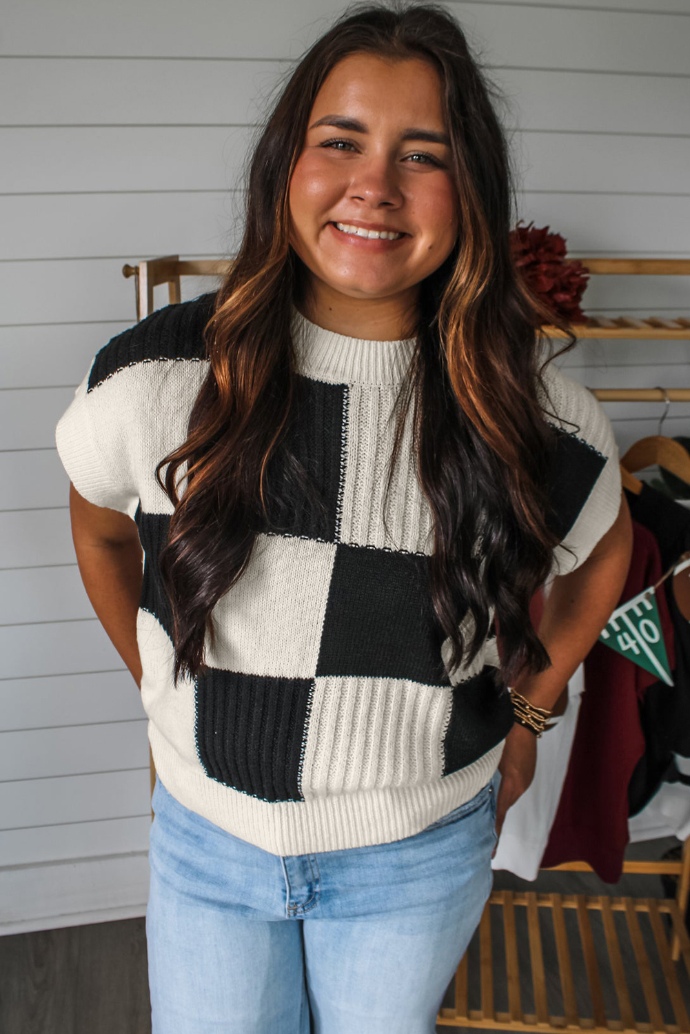 Chic Casual Black Sweater: Checkered Color Block Design with Short Sleeves - Detail View 2 Chic Casual Black Sweater: Checkered Color Block Design with Short Sleeves - Detail View 2