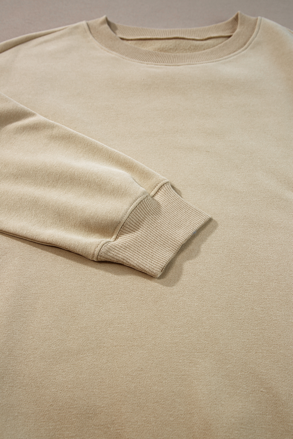 Chic and Cozy: Oversized Long Sleeve Sweatshirt in Parchment Solid Color - Detail View 12 Chic and Cozy: Oversized Long Sleeve Sweatshirt in Parchment Solid Color - Detail View 12