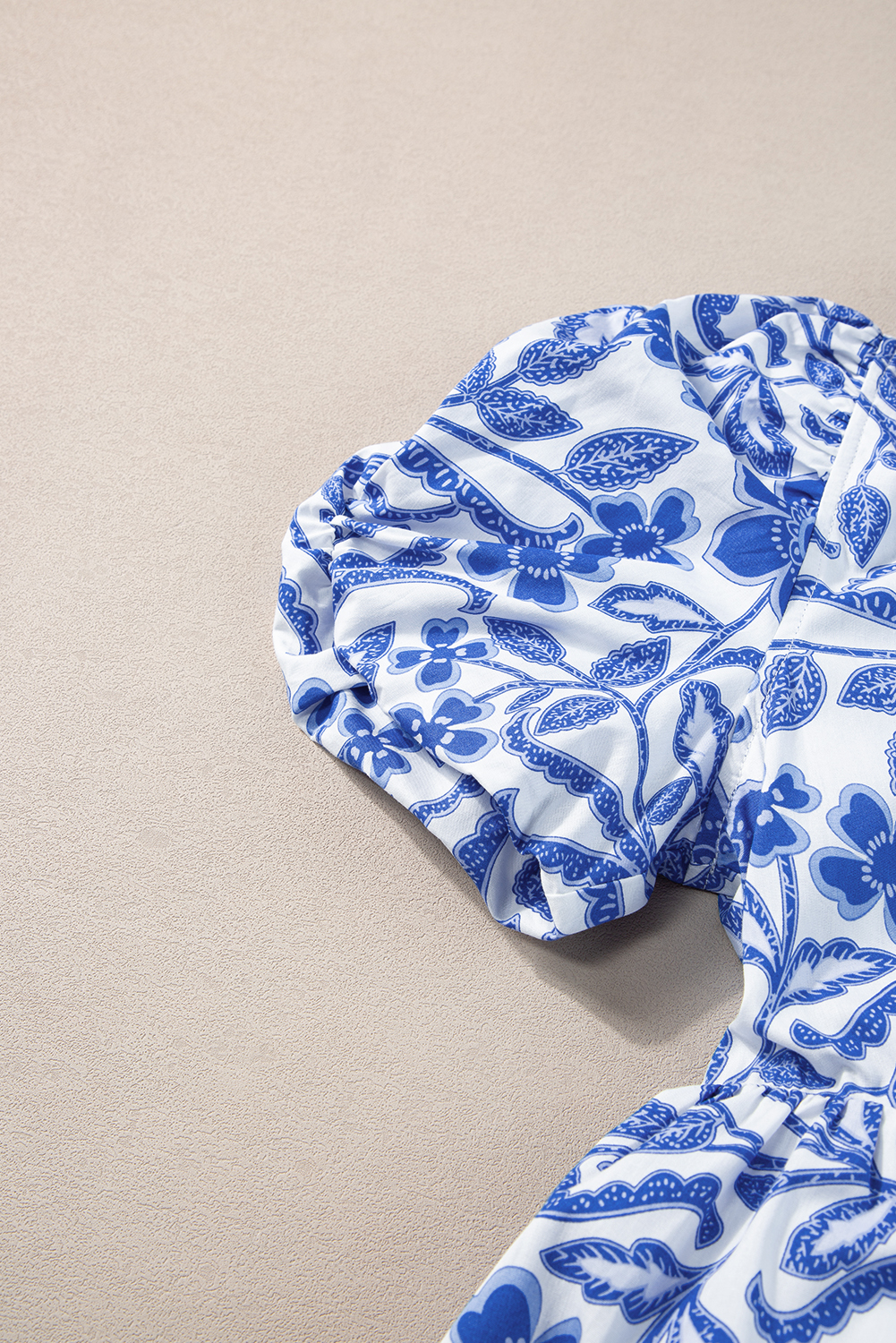 Eye-Catching Short Sleeve Dress: Blue Flower Print with Flowy Puff Sleeves - Detail View 12 Eye-Catching Short Sleeve Dress: Blue Flower Print with Flowy Puff Sleeves - Detail View 12