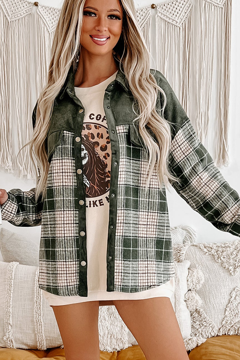 Add a touch of modern and eye-catching style to your wardrobe with this Women's Blackish Green Snap Buttons Colorblock Plaid Shacket. The jacket is combined with trendy corduroy patchwork, featuring a unique colorblock design for a contemporary and fashionable look. The convenient snap buttons provide easy closure and give the shacket a casual vibe. The classic shirt collar adds a touch of sophistication to the style, making it versatile for various occasions. Made from premium 100% polyester, this shacket ensures durability and comfort. The captivating plaid patterns and textures make it a standout piece in your outerwear collection. Perfect for the fall and autumn season, this shacket is a must-have for fashion-forward women who appreciate unique and stylish clothing choices. - Detail View 4 Add a touch of modern and eye-catching style to your wardrobe with this Women's Blackish Green Snap Buttons Colorblock Plaid Shacket. The jacket is combined with trendy corduroy patchwork, featuring a unique colorblock design for a contemporary and fashionable look. The convenient snap buttons provide easy closure and give the shacket a casual vibe. The classic shirt collar adds a touch of sophistication to the style, making it versatile for various occasions. Made from premium 100% polyester, this shacket ensures durability and comfort. The captivating plaid patterns and textures make it a standout piece in your outerwear collection. Perfect for the fall and autumn season, this shacket is a must-have for fashion-forward women who appreciate unique and stylish clothing choices. - Detail View 4