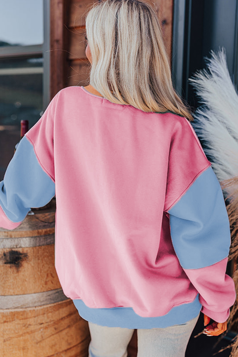 Stay comfortable and stylish with this Women's Sky Blue Colorblock Patchwork Drop Shoulder Sweatshirt. The loose fit and dropped shoulder design provide a relaxed and casual vibe, perfect for daily wear. The trendy colorblock design adds a modern touch, while the unique patchwork details bring a creative twist. Made from a blend of 70% polyester and 30% cotton, this sweatshirt ensures durability and breathability. The sky blue color is both calming and uplifting, making it perfect for fall and autumn wear. Add this sweatshirt to your wardrobe to update your style with a laid-back and fashionable touch. - Detail View 4 Stay comfortable and stylish with this Women's Sky Blue Colorblock Patchwork Drop Shoulder Sweatshirt. The loose fit and dropped shoulder design provide a relaxed and casual vibe, perfect for daily wear. The trendy colorblock design adds a modern touch, while the unique patchwork details bring a creative twist. Made from a blend of 70% polyester and 30% cotton, this sweatshirt ensures durability and breathability. The sky blue color is both calming and uplifting, making it perfect for fall and autumn wear. Add this sweatshirt to your wardrobe to update your style with a laid-back and fashionable touch. - Detail View 4