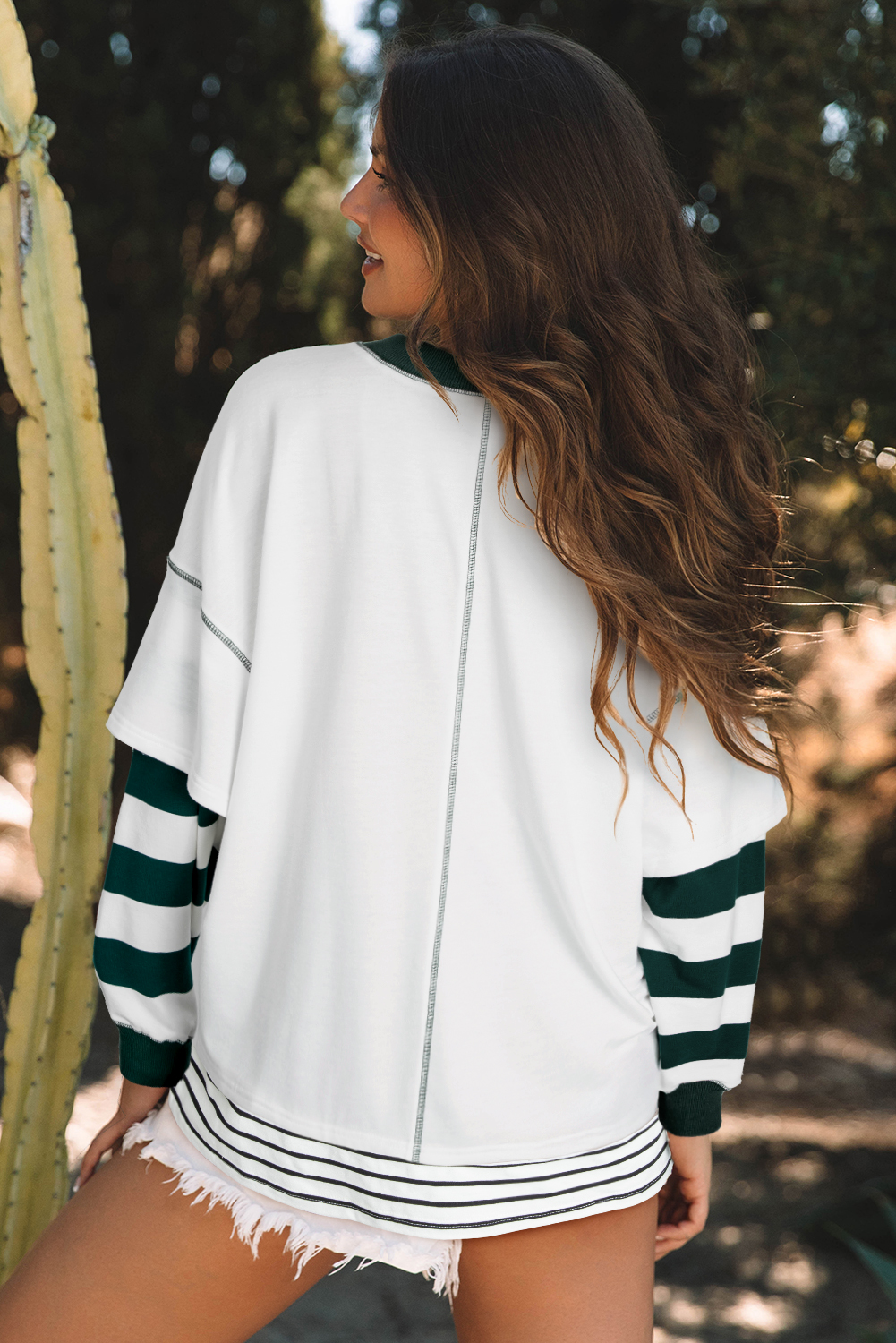 Stylish and Casual Women's Sweatshirt with Colorblock Stripes and Exposed Seams - Detail View 2 Stylish and Casual Women's Sweatshirt with Colorblock Stripes and Exposed Seams - Detail View 2