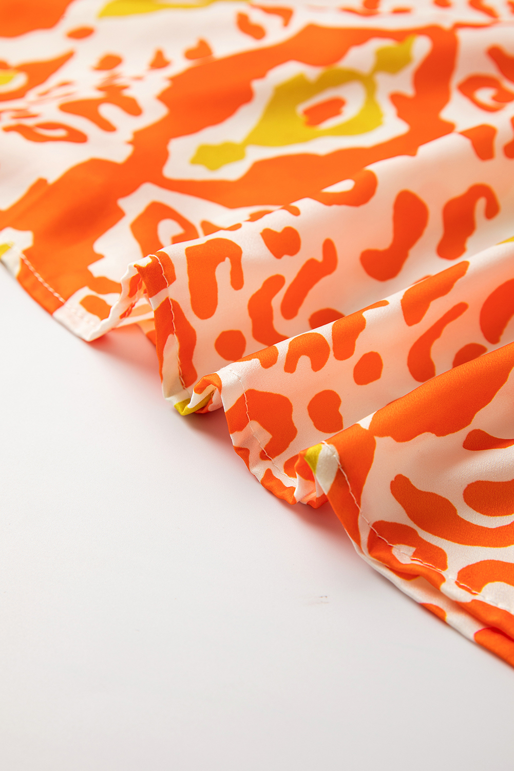 Women's Orange Leopard Colorblock Puff Sleeve Split Neck Blouse - Detail View 11 Women's Orange Leopard Colorblock Puff Sleeve Split Neck Blouse - Detail View 11