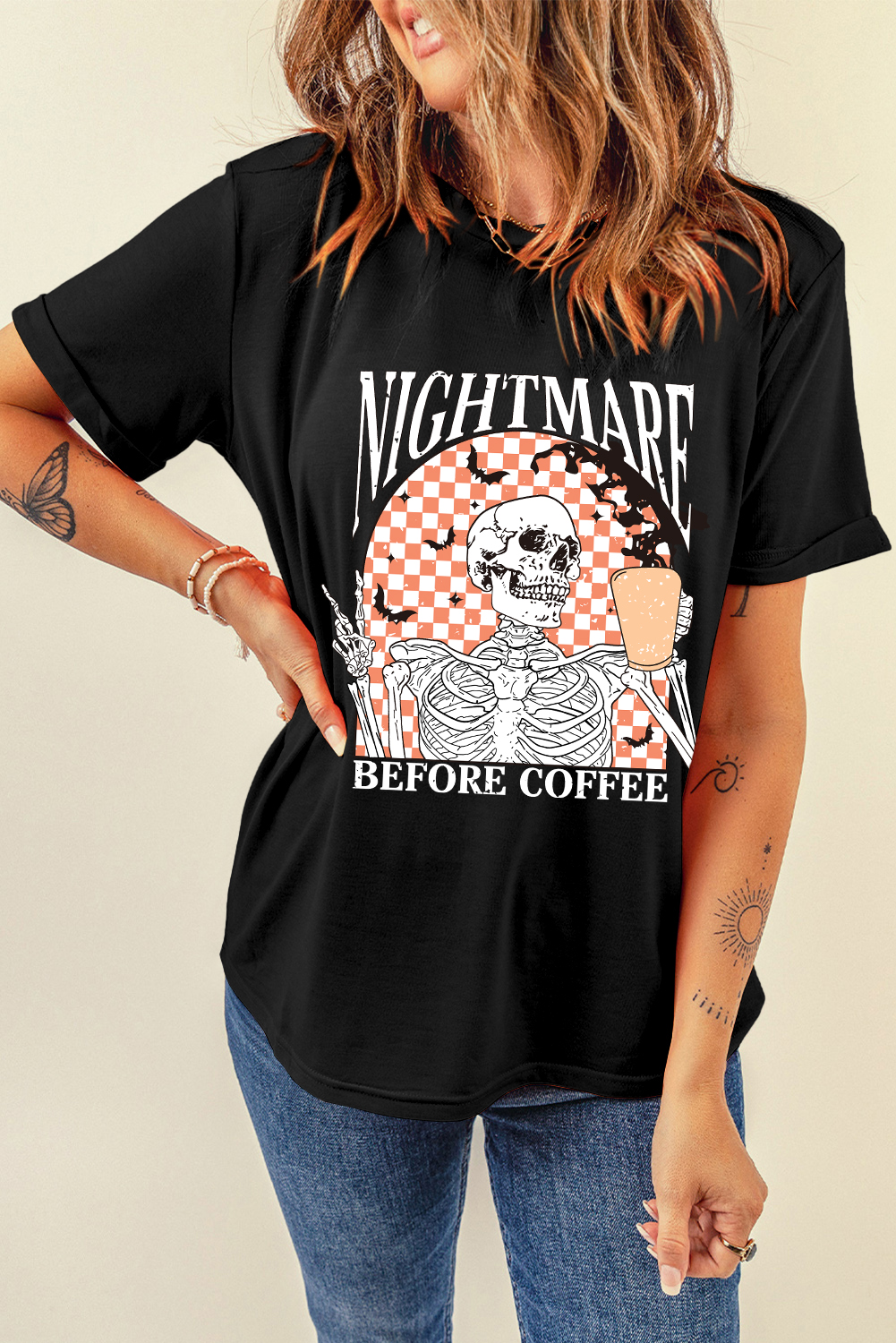 Get ready for a spooky Halloween with this Women's Black Skull Checkerboard Graphic Halloween Tee. Featuring a chill skull design on a checkered background, this graphic tee adds a touch of darkness to your style. The comfortable crew neck and relaxed shift fit make it perfect for casual wear, while the graphic design is sure to spark conversations at Halloween parties. This tee is a must-have for Halloween enthusiasts and casual goths, and the premium material ensures durability and comfort. Pair it with your favorite jeans and boots for a chic and spooky look. - Detail View 9 Get ready for a spooky Halloween with this Women's Black Skull Checkerboard Graphic Halloween Tee. Featuring a chill skull design on a checkered background, this graphic tee adds a touch of darkness to your style. The comfortable crew neck and relaxed shift fit make it perfect for casual wear, while the graphic design is sure to spark conversations at Halloween parties. This tee is a must-have for Halloween enthusiasts and casual goths, and the premium material ensures durability and comfort. Pair it with your favorite jeans and boots for a chic and spooky look. - Detail View 9