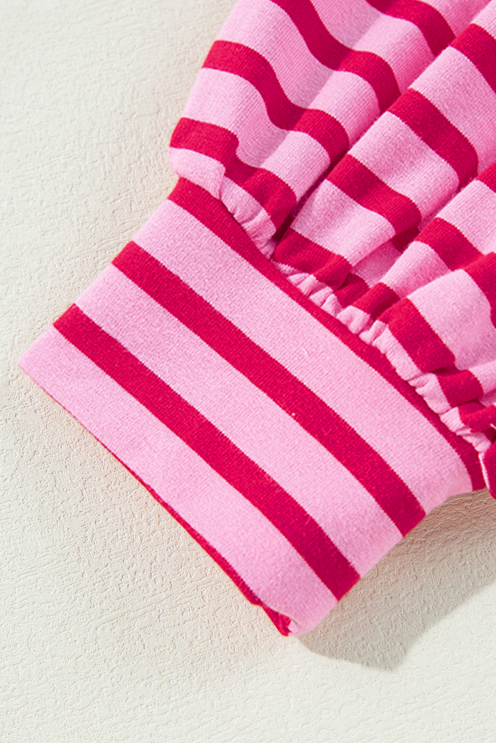 Elevate your casual style with this Women's Sachet Pink Striped Print Crew Neck Drop Shoulder Sweatshirt. The classic crew neck design and relaxed drop shoulder silhouette come together to create a comfortable and modern look. The loose fit ensures an effortless feel, while the 95% cotton and 5% elastane blend provides a soft and stretchy fabric. The striking sachet pink striped print adds a pop of color and visual interest to your outfit. Perfect for daily wear during the fall and autumn seasons, this sweatshirt is a must-have for your casual wardrobe. Pair it with your favorite jeans or leggings for a chic and cozy look. - Detail View 9 Elevate your casual style with this Women's Sachet Pink Striped Print Crew Neck Drop Shoulder Sweatshirt. The classic crew neck design and relaxed drop shoulder silhouette come together to create a comfortable and modern look. The loose fit ensures an effortless feel, while the 95% cotton and 5% elastane blend provides a soft and stretchy fabric. The striking sachet pink striped print adds a pop of color and visual interest to your outfit. Perfect for daily wear during the fall and autumn seasons, this sweatshirt is a must-have for your casual wardrobe. Pair it with your favorite jeans or leggings for a chic and cozy look. - Detail View 9