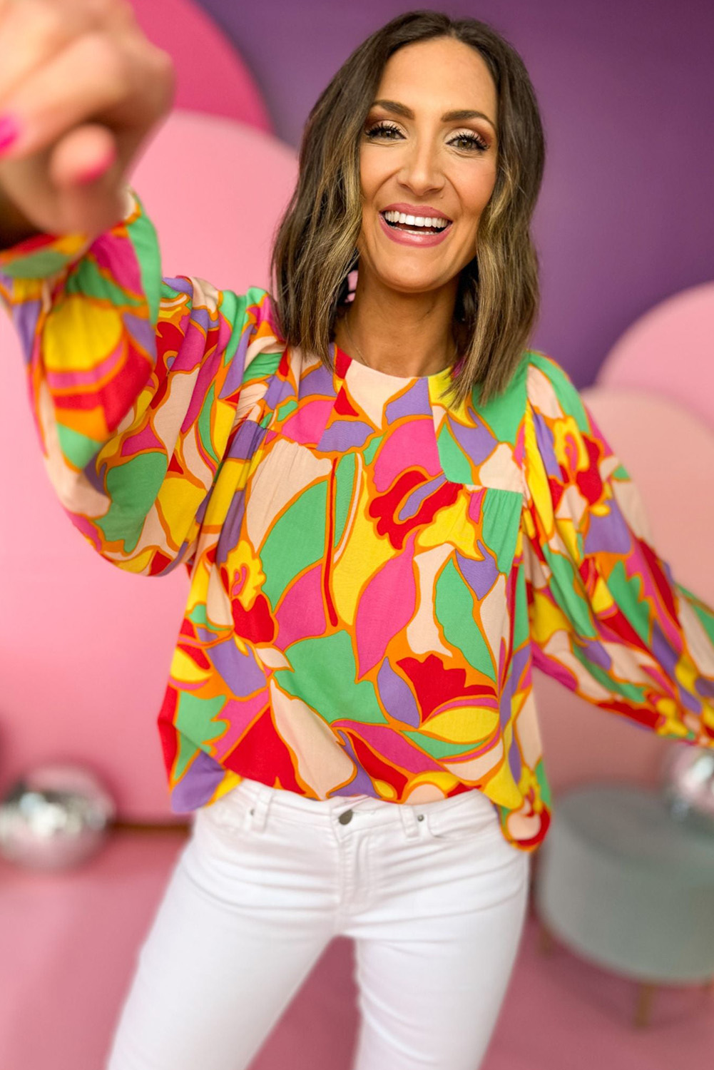Add a pop of color and personality to your outfit with this Women's Yellow Abstract Print Puff Sleeve Blouse. The blouse features a round neck, puff sleeves, and a relaxed fit silhouette, making it a perfect choice for daily wear. The lightweight and sleek design ensures comfortable wearing, and the unique abstract pattern adds a touch of elegance. Pair it with solid leggings and tights for women for a chic and stylish look. This blouse is perfect for those who love bright and bold colors and want to make a statement with their outfit. It's a must-have addition to your wardrobe, offering both fashion and comfort. - Detail View 4 Add a pop of color and personality to your outfit with this Women's Yellow Abstract Print Puff Sleeve Blouse. The blouse features a round neck, puff sleeves, and a relaxed fit silhouette, making it a perfect choice for daily wear. The lightweight and sleek design ensures comfortable wearing, and the unique abstract pattern adds a touch of elegance. Pair it with solid leggings and tights for women for a chic and stylish look. This blouse is perfect for those who love bright and bold colors and want to make a statement with their outfit. It's a must-have addition to your wardrobe, offering both fashion and comfort. - Detail View 4