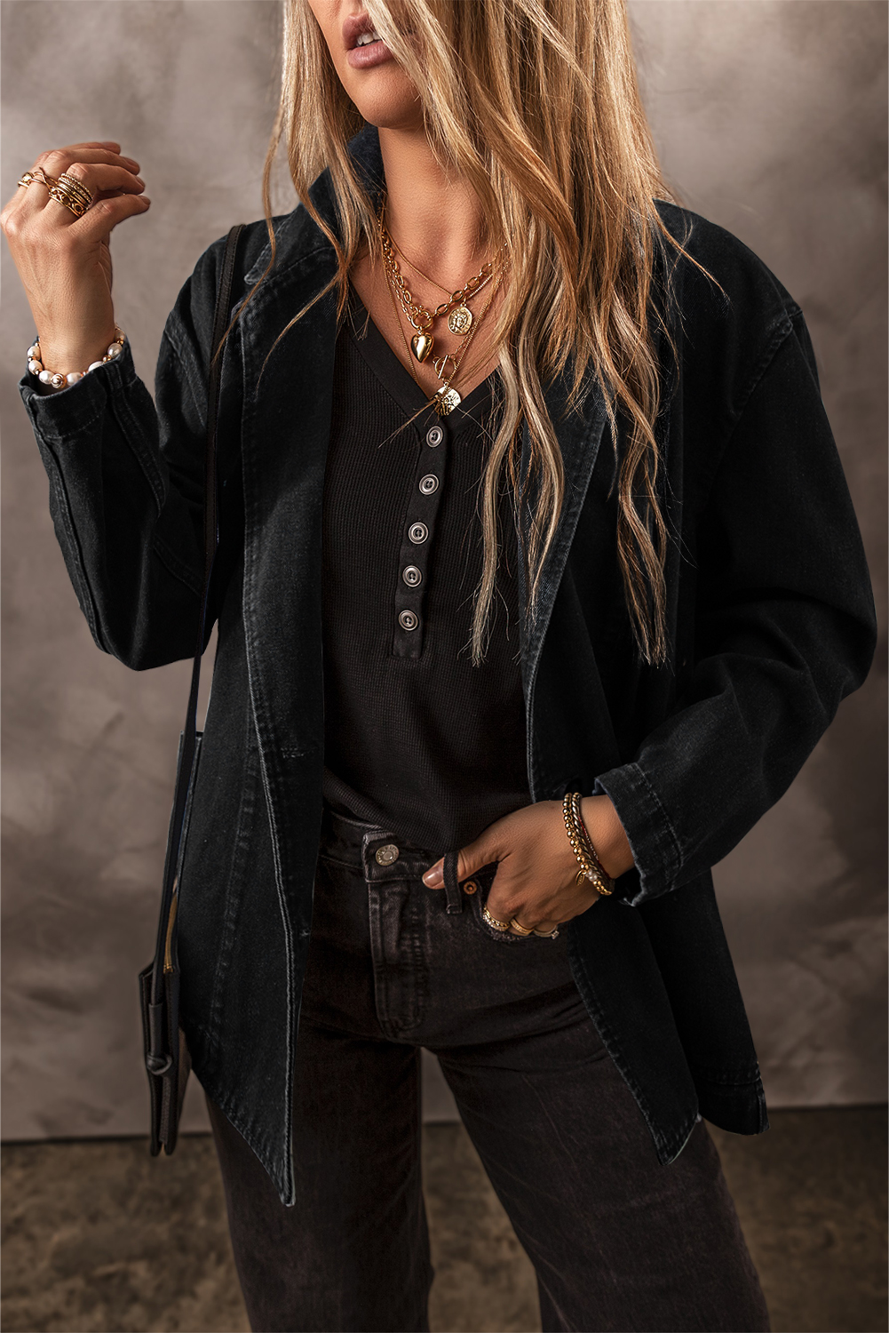 Elevate your casual style with this Women's Classic Black Denim Jacket. The lapel collar adds a touch of sophistication, while the functional side pockets provide practicality and style. Made from a durable blend of 75% cotton and 25% polyester, this denim jacket is perfect for various occasions, from daily wear to parties and gatherings. The solid black color is versatile and easy to match with any outfit. The long sleeves and shift silhouette ensure a comfortable and flattering fit. This classic denim jacket is a must-have addition to your wardrobe, suitable for ladies of all ages. - Detail View 4 Elevate your casual style with this Women's Classic Black Denim Jacket. The lapel collar adds a touch of sophistication, while the functional side pockets provide practicality and style. Made from a durable blend of 75% cotton and 25% polyester, this denim jacket is perfect for various occasions, from daily wear to parties and gatherings. The solid black color is versatile and easy to match with any outfit. The long sleeves and shift silhouette ensure a comfortable and flattering fit. This classic denim jacket is a must-have addition to your wardrobe, suitable for ladies of all ages. - Detail View 4