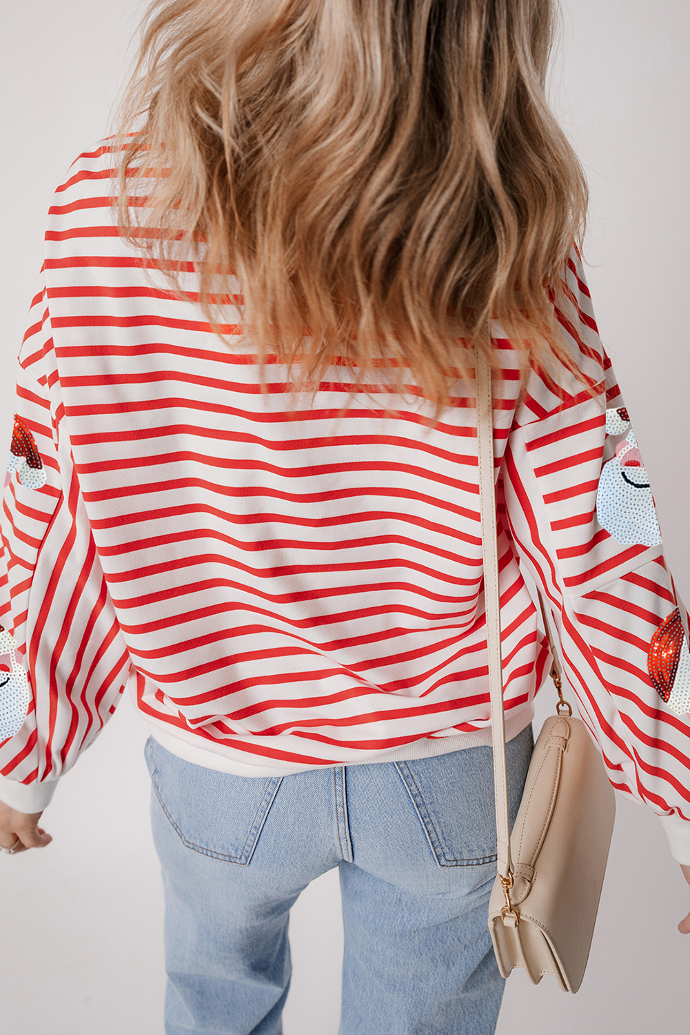 Festive Crew Neck Sweatshirt with Striped Design and Shimmering Santa Claus Graphic - Detail View 2 Festive Crew Neck Sweatshirt with Striped Design and Shimmering Santa Claus Graphic - Detail View 2