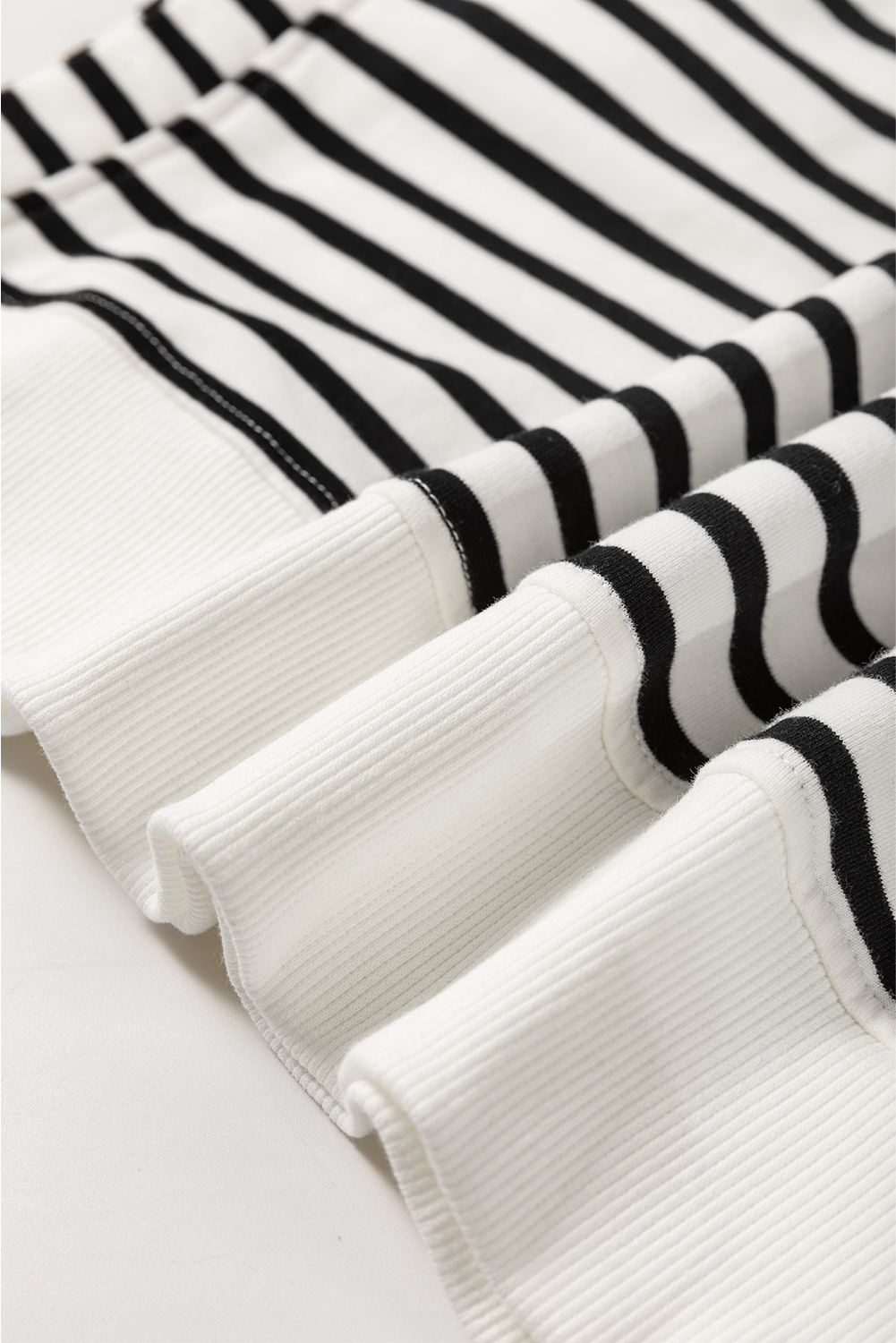 Women's Black Stripe Raglan Sleeve Loose Fit Sweatshirt with Side Slits - Detail View 11 Women's Black Stripe Raglan Sleeve Loose Fit Sweatshirt with Side Slits - Detail View 11