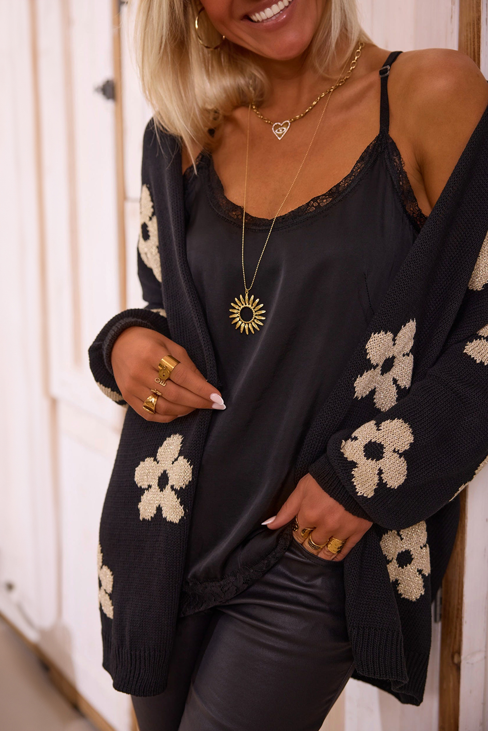 Add a touch of feminine charm to your wardrobe with this Women's Black Floral Print Knitted Open Front Loose Cardigan. The knitted construction ensures warmth and comfort, while the open front design allows for easy layering and styling. The tunic length provides added coverage and versatility, making it perfect for daily wear. The cardigan's casual yet chic design strikes the perfect balance between relaxation and elegance. The floral print adds a vintage touch, making it suitable for fall and autumn occasions. Made from a soft blend of 55% acrylic and 45% cotton, this cardigan is a must-have for any woman's wardrobe. - Detail View 4 Add a touch of feminine charm to your wardrobe with this Women's Black Floral Print Knitted Open Front Loose Cardigan. The knitted construction ensures warmth and comfort, while the open front design allows for easy layering and styling. The tunic length provides added coverage and versatility, making it perfect for daily wear. The cardigan's casual yet chic design strikes the perfect balance between relaxation and elegance. The floral print adds a vintage touch, making it suitable for fall and autumn occasions. Made from a soft blend of 55% acrylic and 45% cotton, this cardigan is a must-have for any woman's wardrobe. - Detail View 4